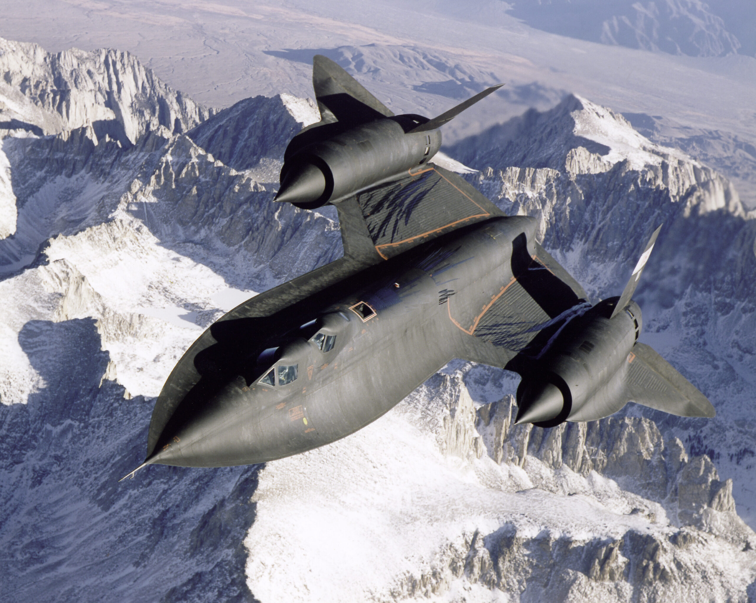 SR-71 Over Snow Capped Mountains