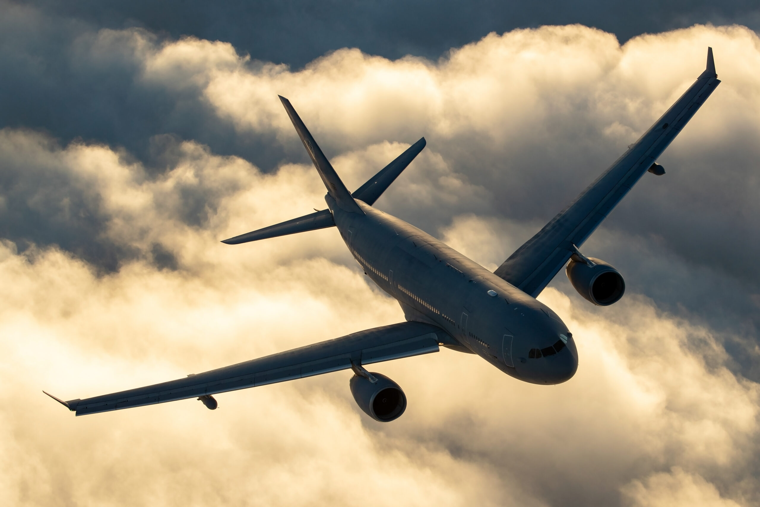 Airbus A330 MRTT T-056 above golden clouds