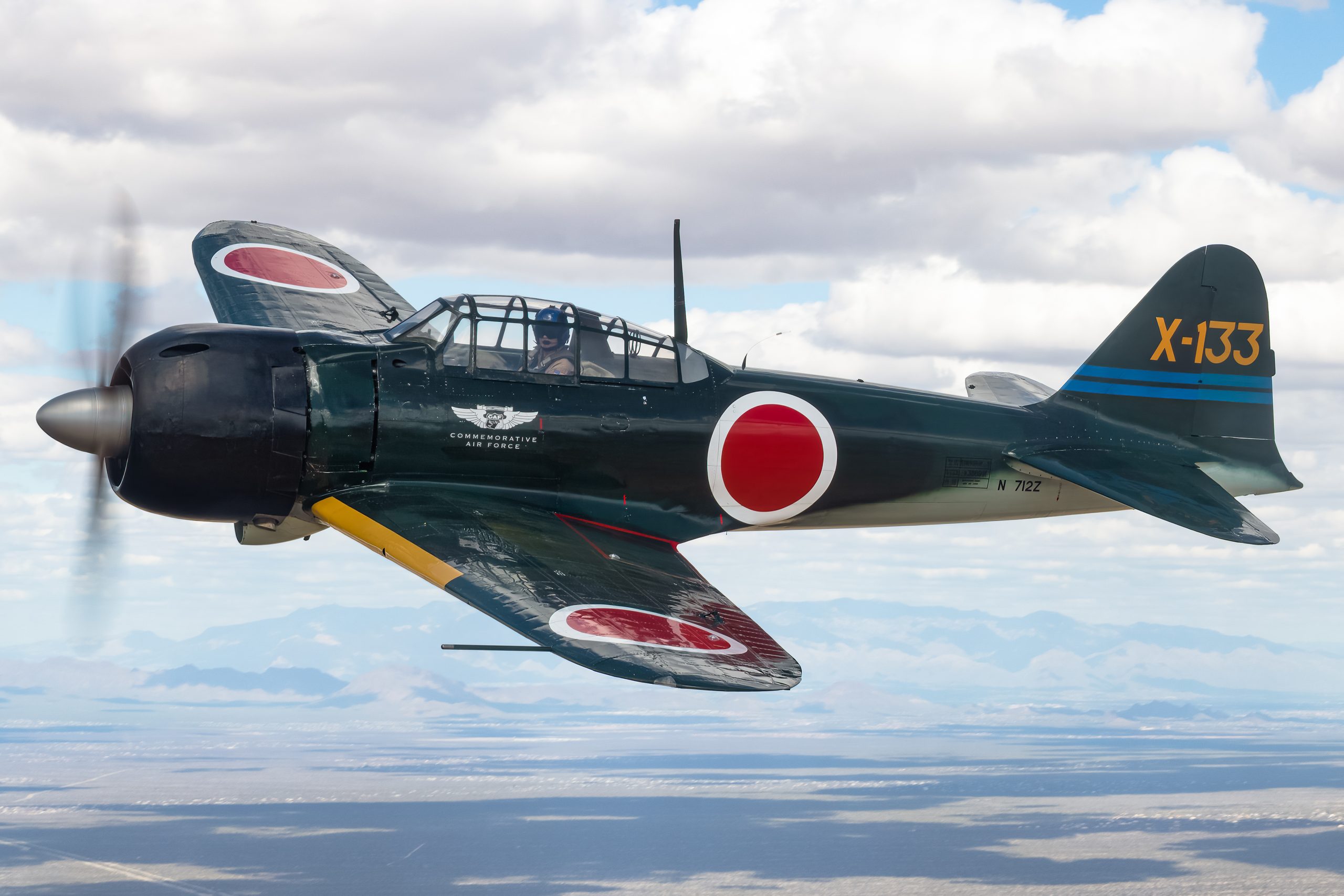 Mitsubishi A6M3 Zero N712Z close up side view showing X-133 tail code, air to air
