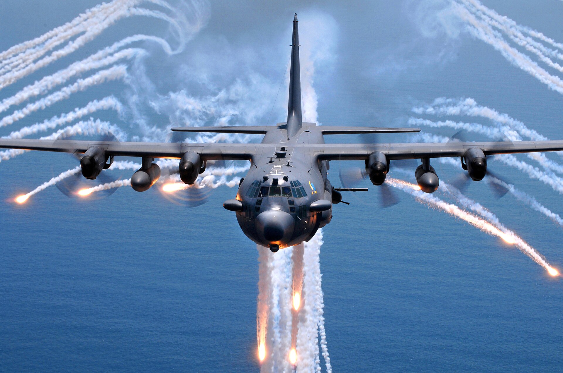 An AC-130 gunship releasing defensive flares