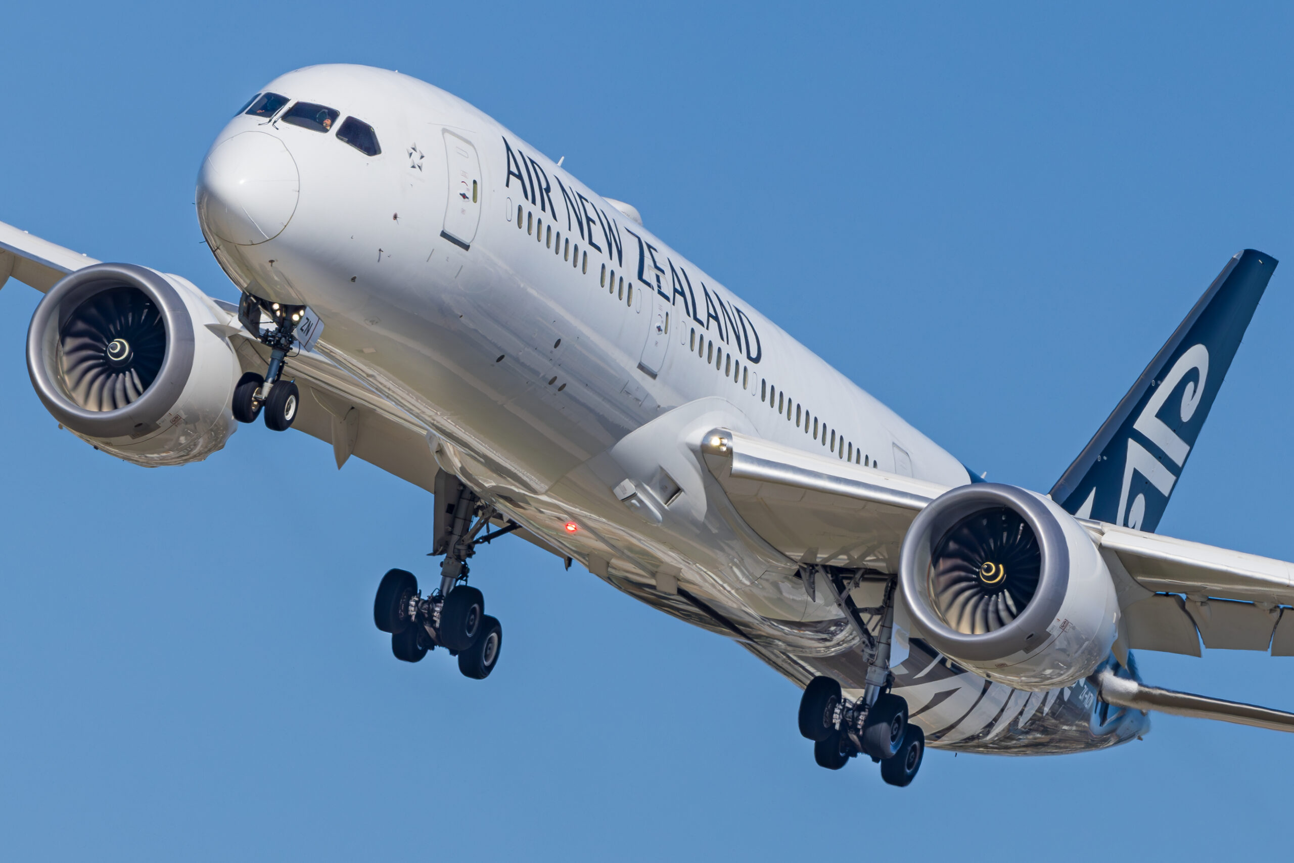 Air New Zealand Boeing 787-9 close up on approach with gear down, black tail with white koru visible