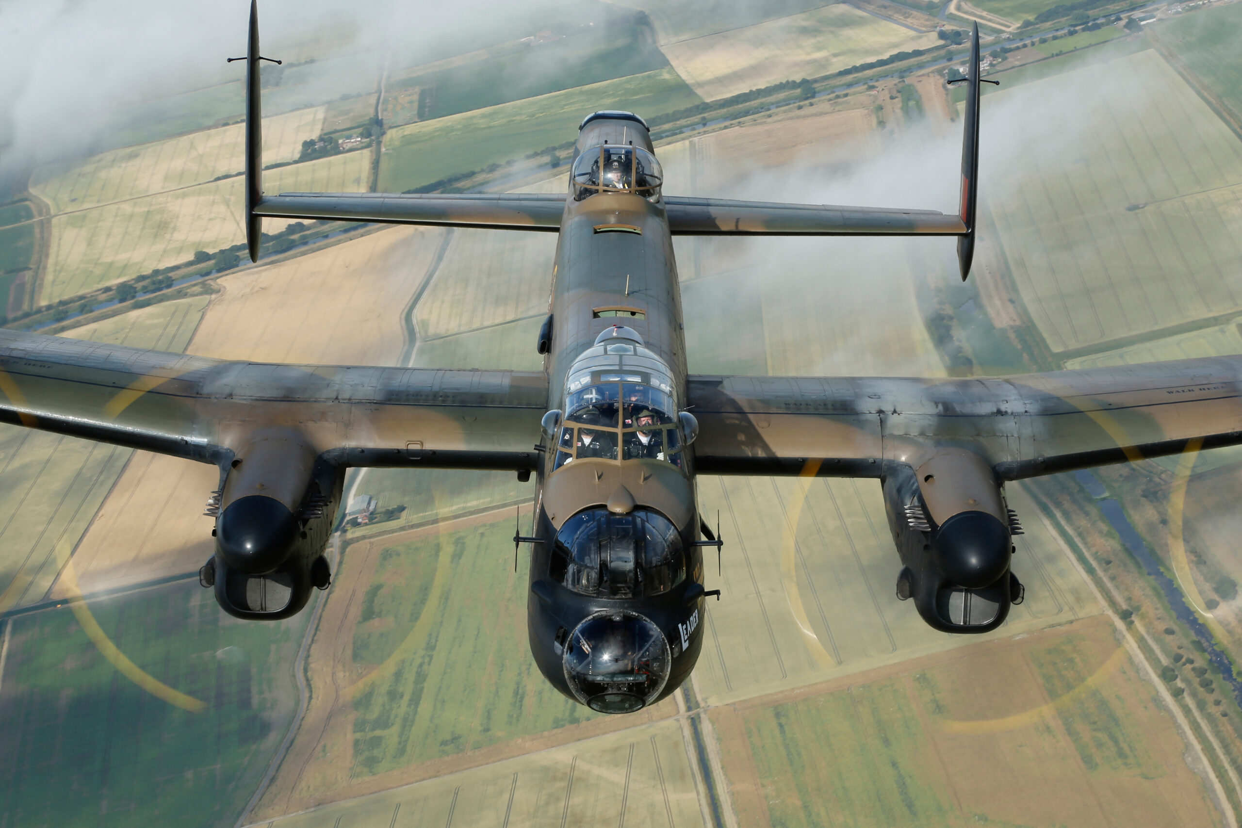 Avro Lancaster PA474 head-on with all four propellers blurred into full discs