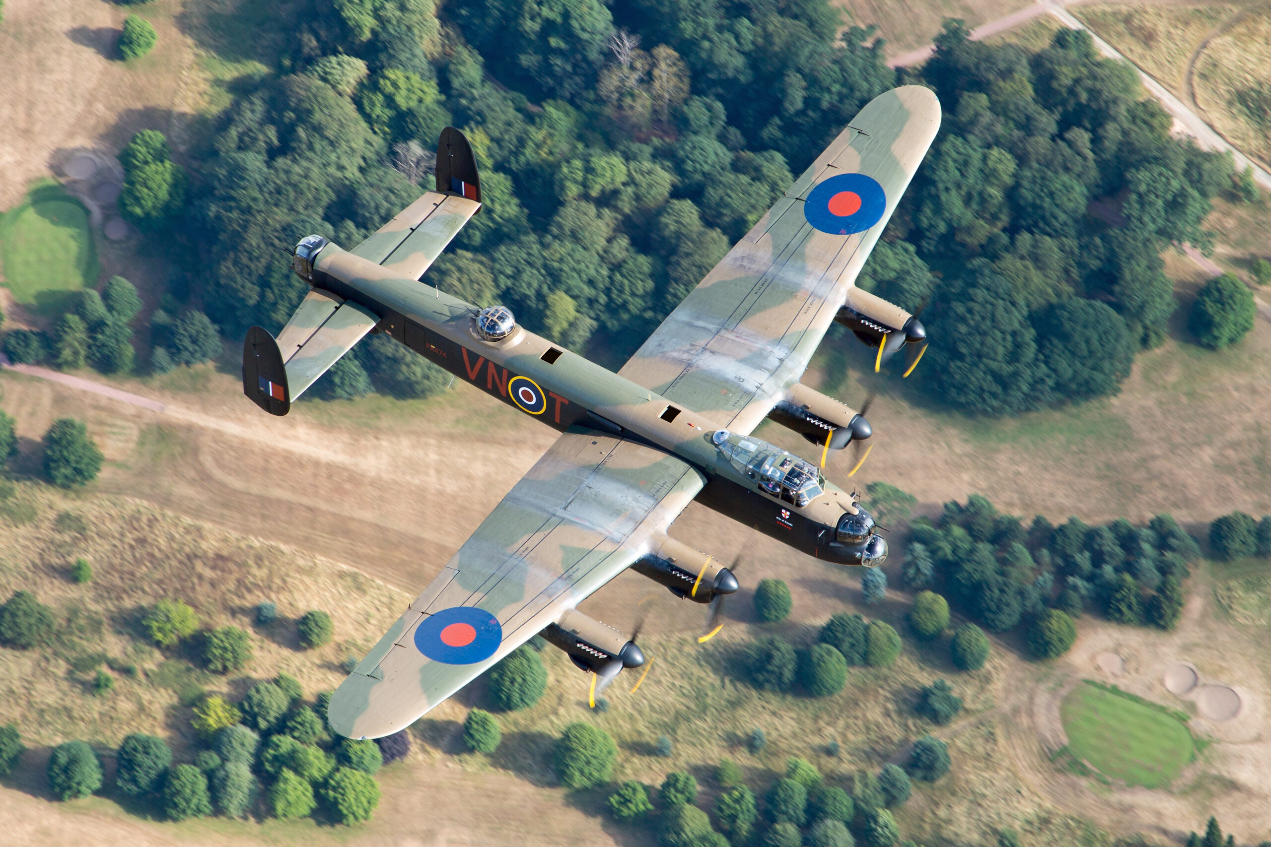 Avro Lancaster PA474 banking to show its full topside camouflage, coded VN-T
