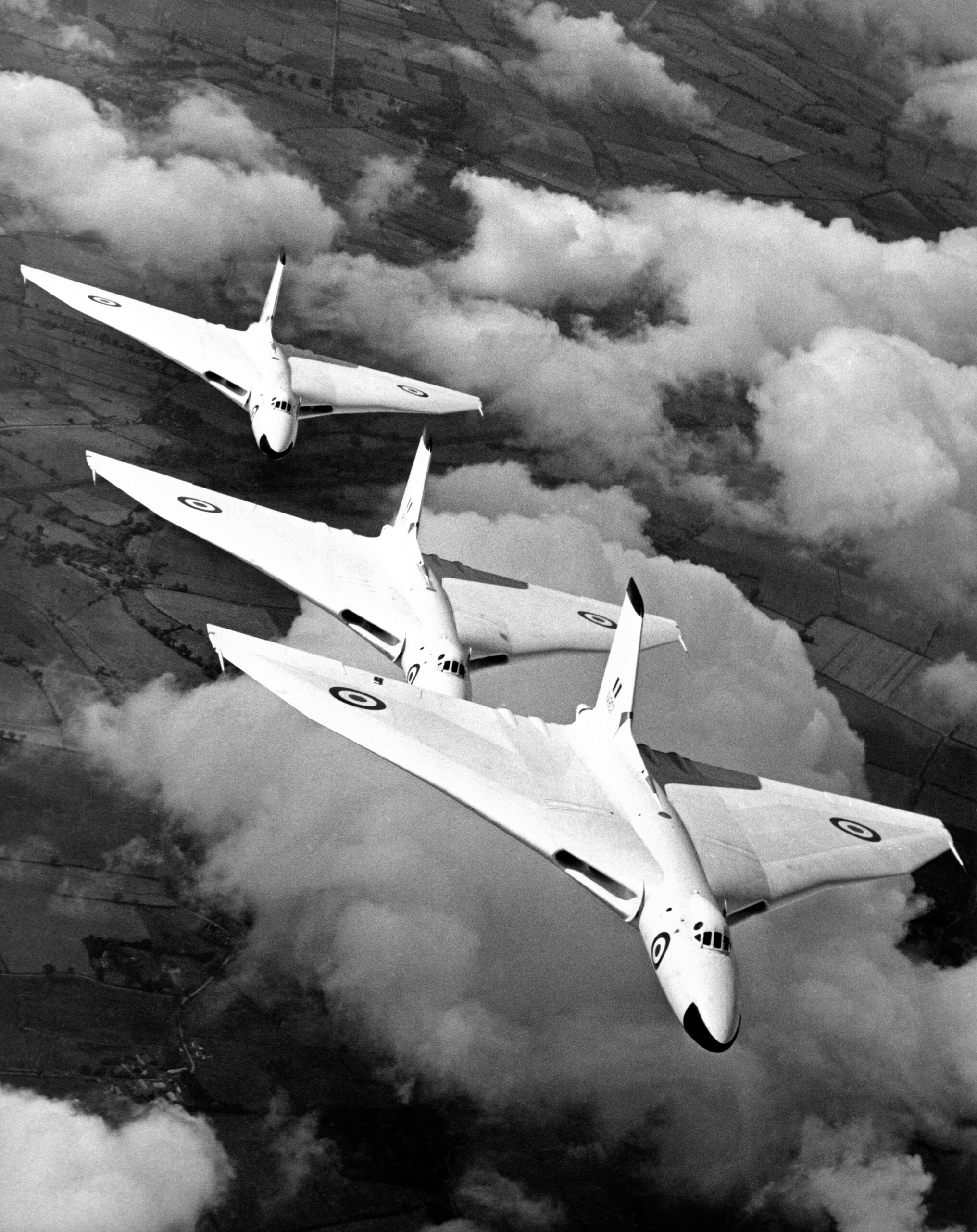 Three anti-flash white Avro Vulcan B1A bombers of the Waddington Wing in formation flight, 1957