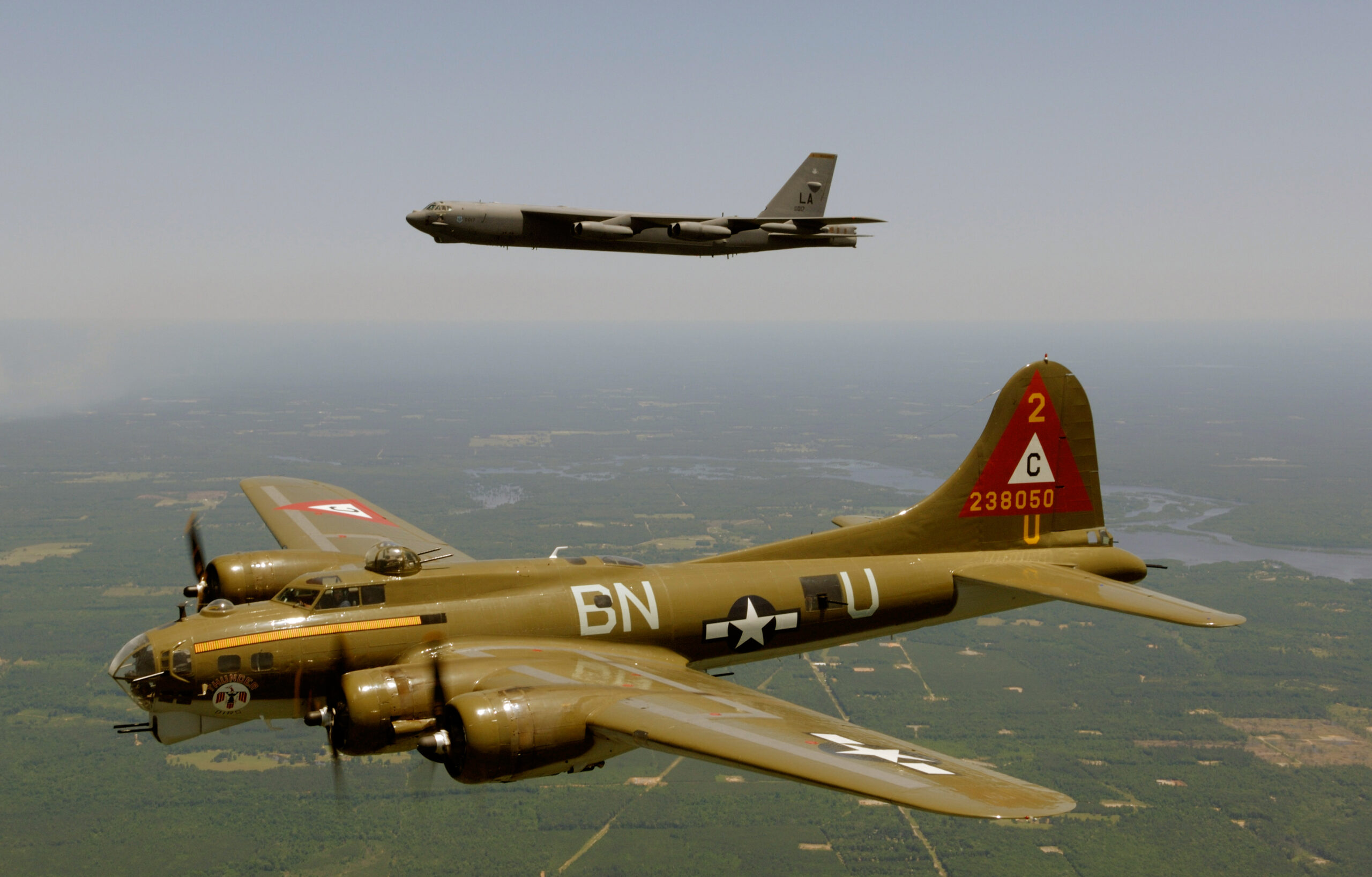 B-17G Flying Fortress and B-52H Stratofortress flying in heritage formation, photographed air-to-air