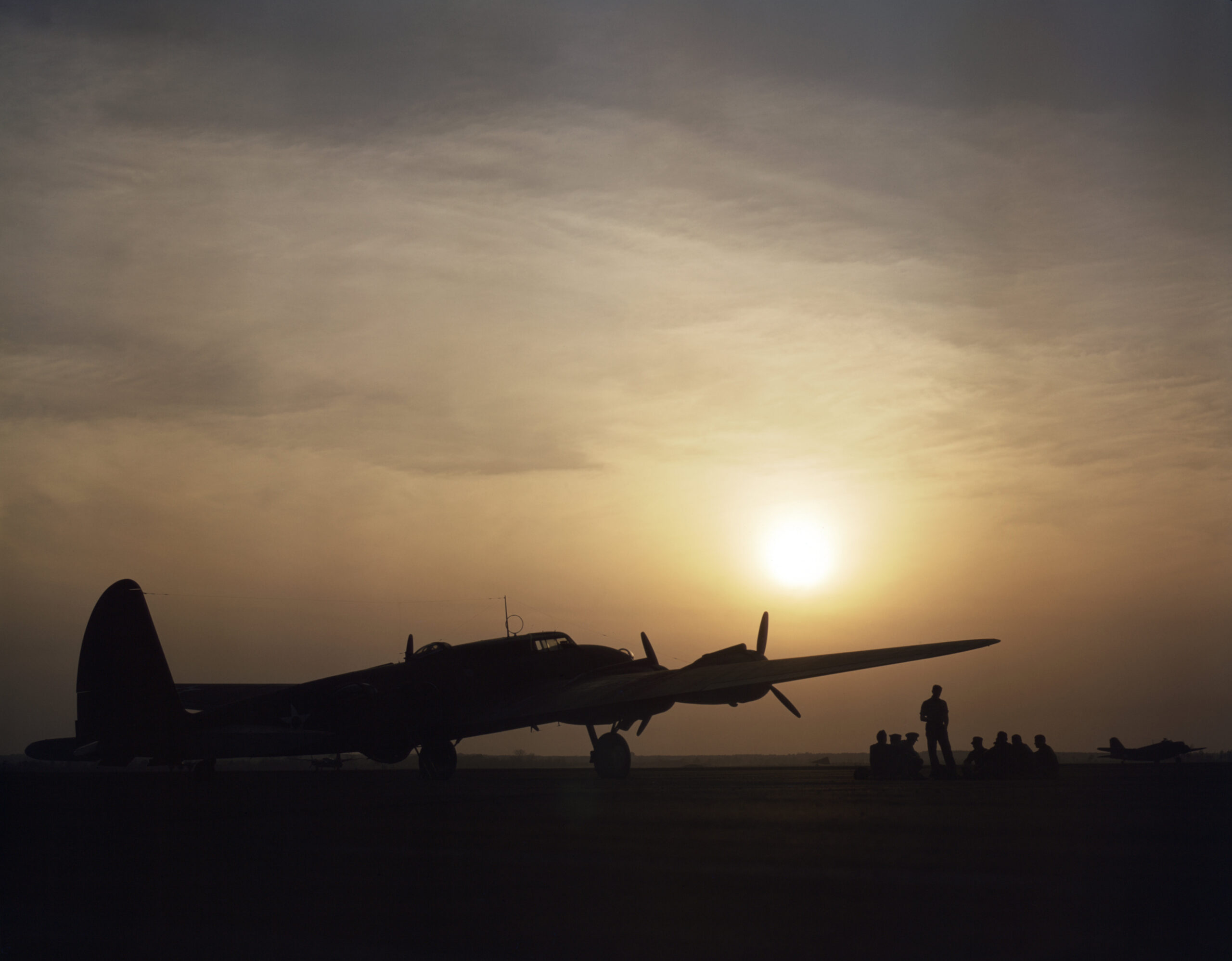 Sunset silhouette of a B-17 Flying Fortress at Langley Field, Virginia