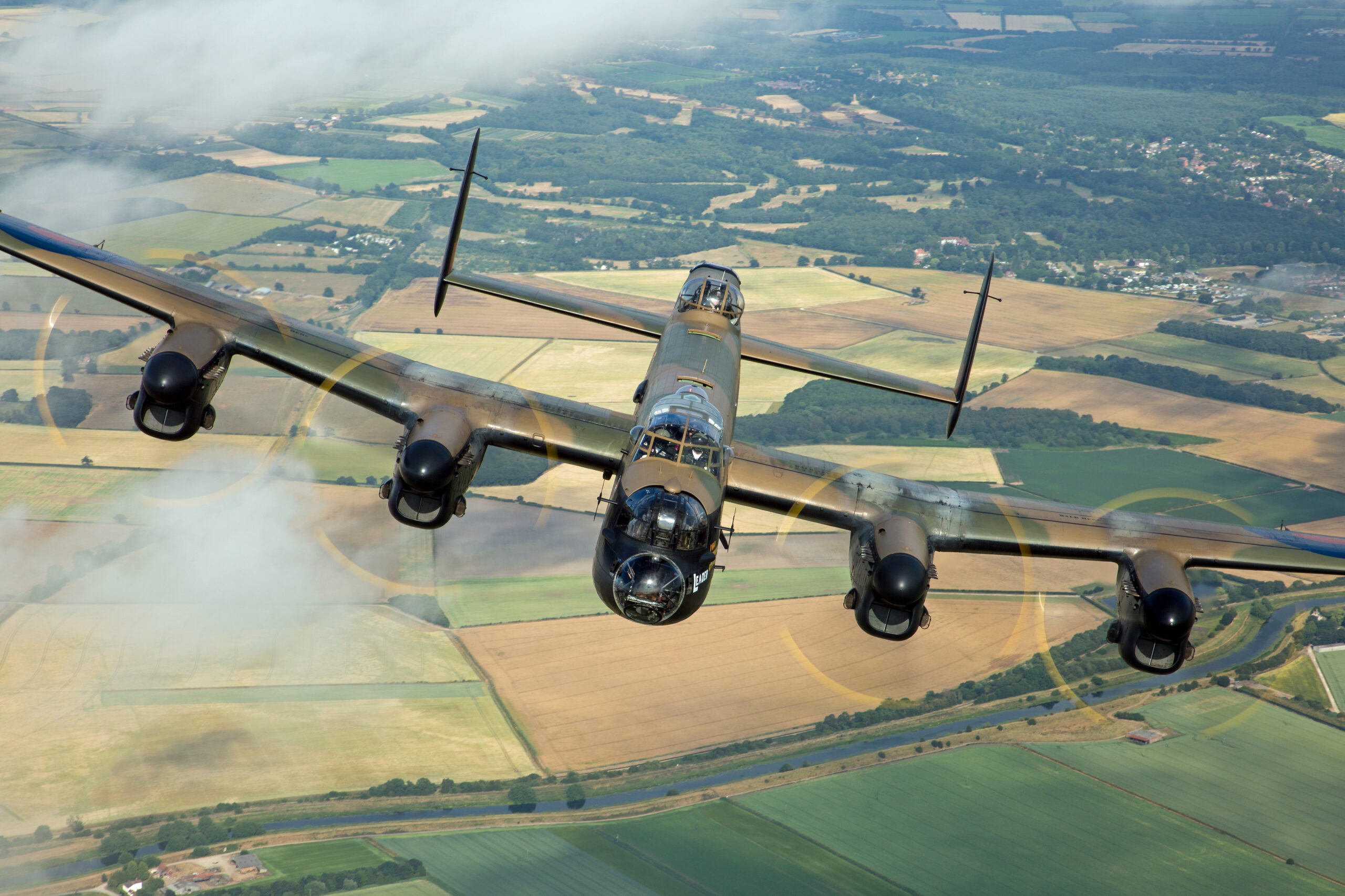 Head-on air to air view of Avro Lancaster PA474 with all four propellers turning