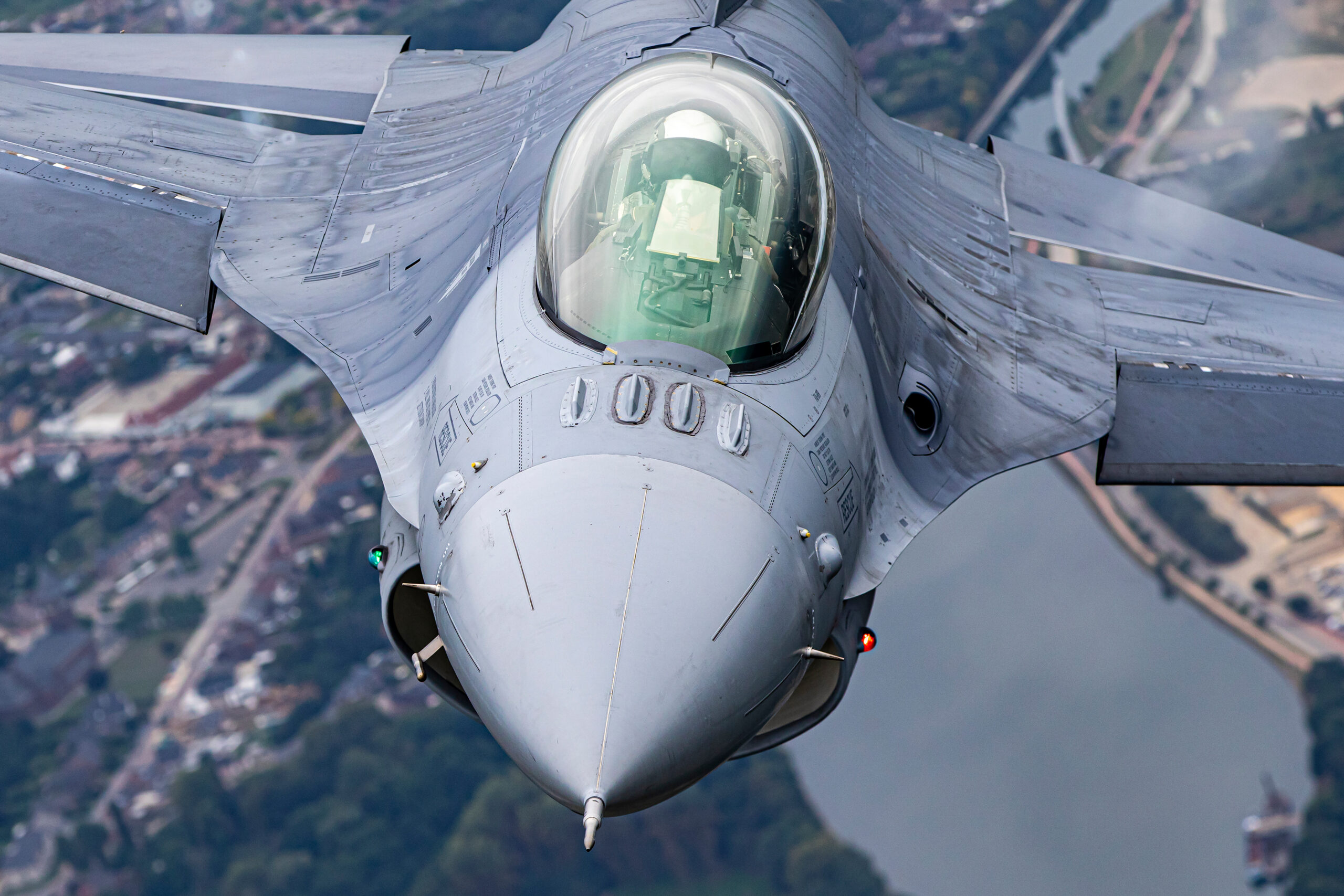 Head-on close-up of a Belgian Air Force F-16 Fighting Falcon canopy air to air