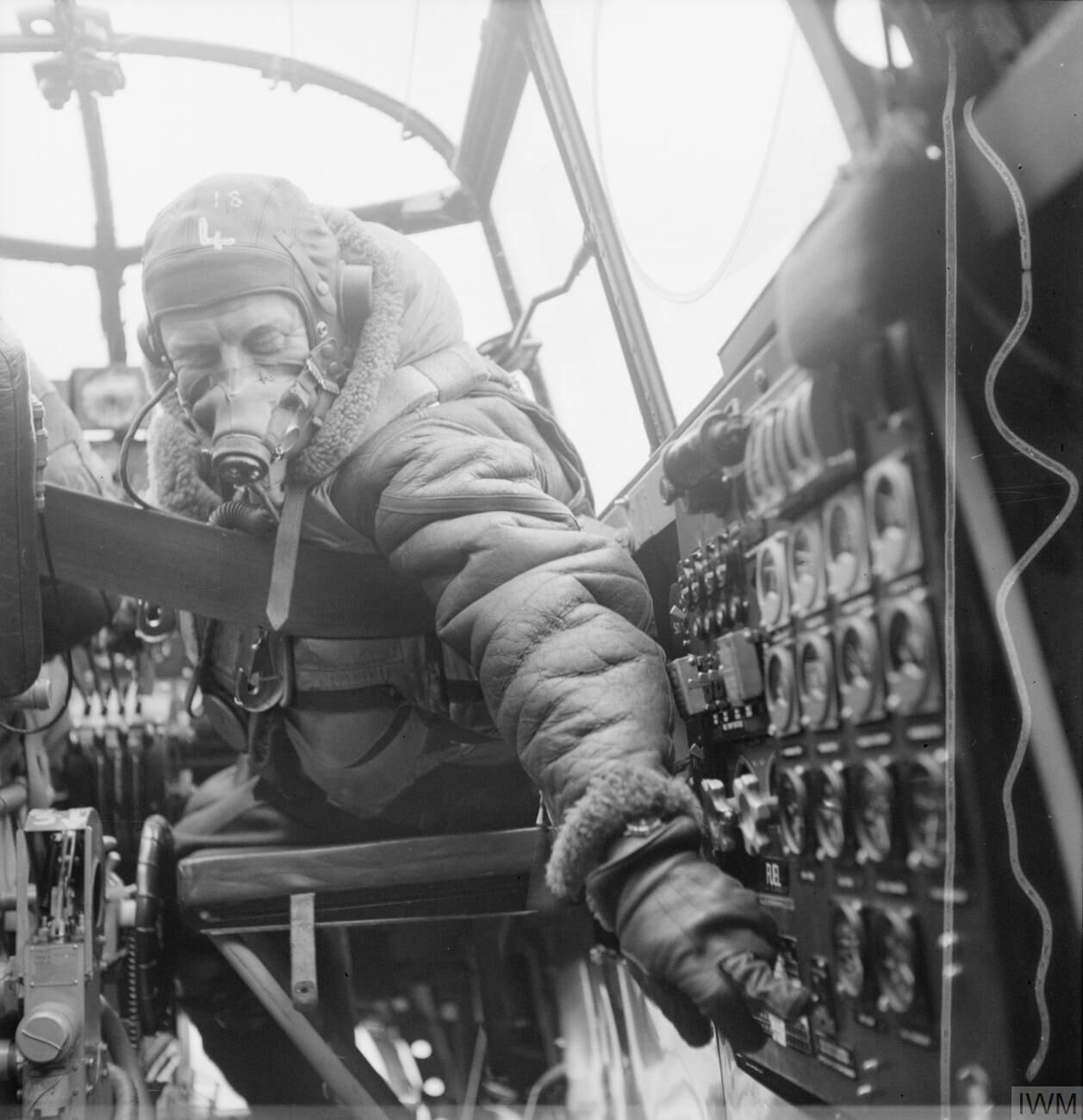 A Lancaster flight engineer at his panel