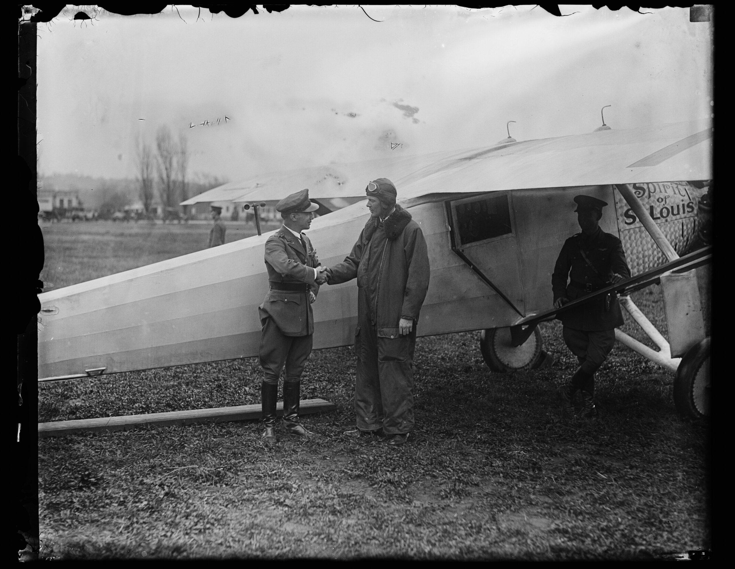 Charles Lindbergh standing with the Spirit of St. Louis in 1927