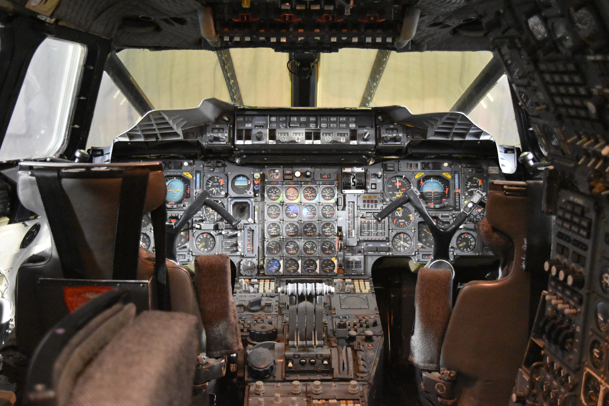 Flight deck of British Airways Concorde G-BOAA showing analogue instruments and three crew stations