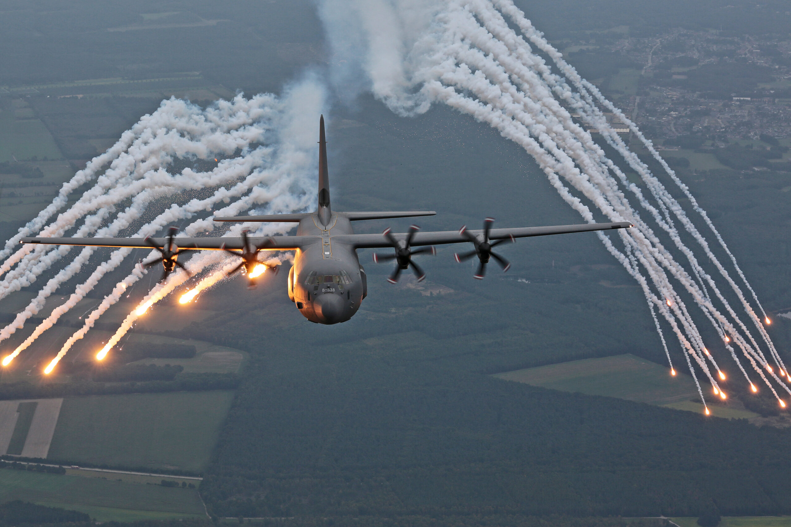 Royal Danish Air Force C-130J Hercules releasing flares air to air