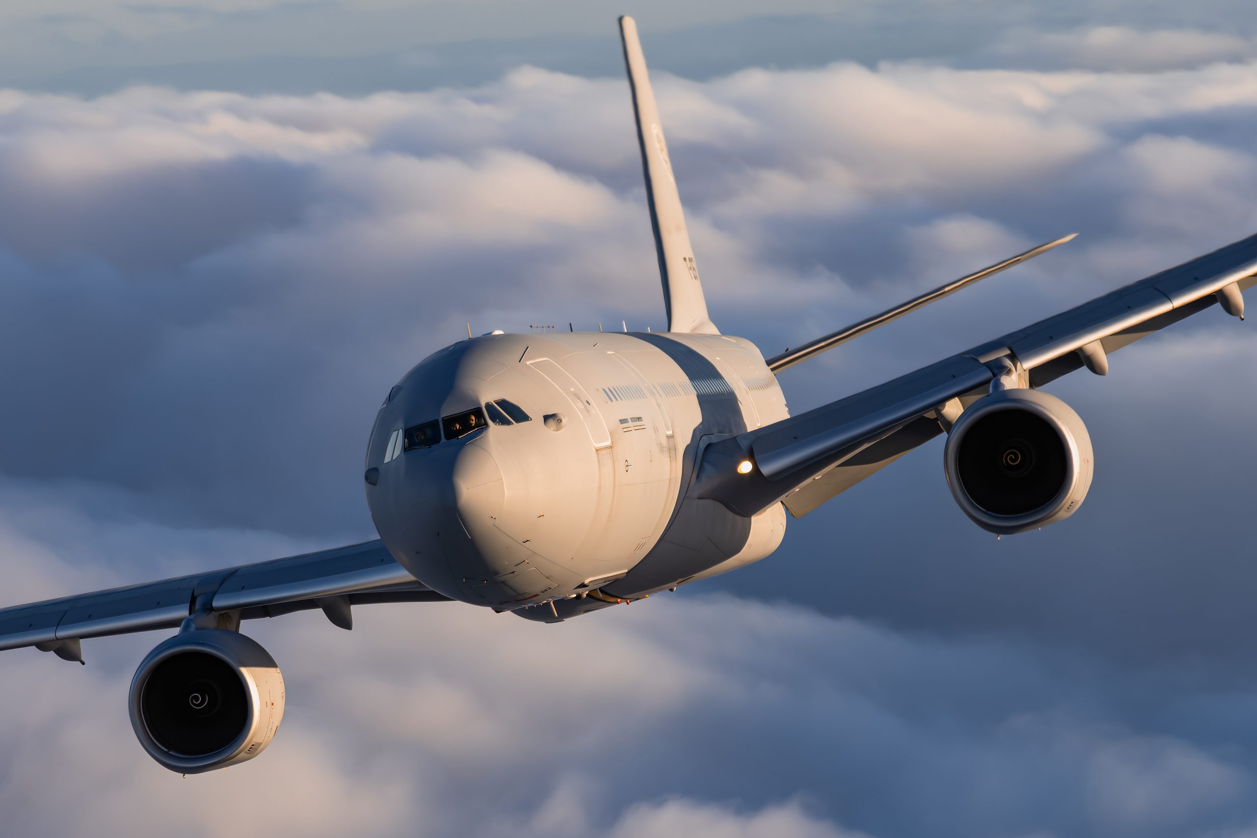 Netherlands Air Force A330 MRTT tanker over a grey cloud deck