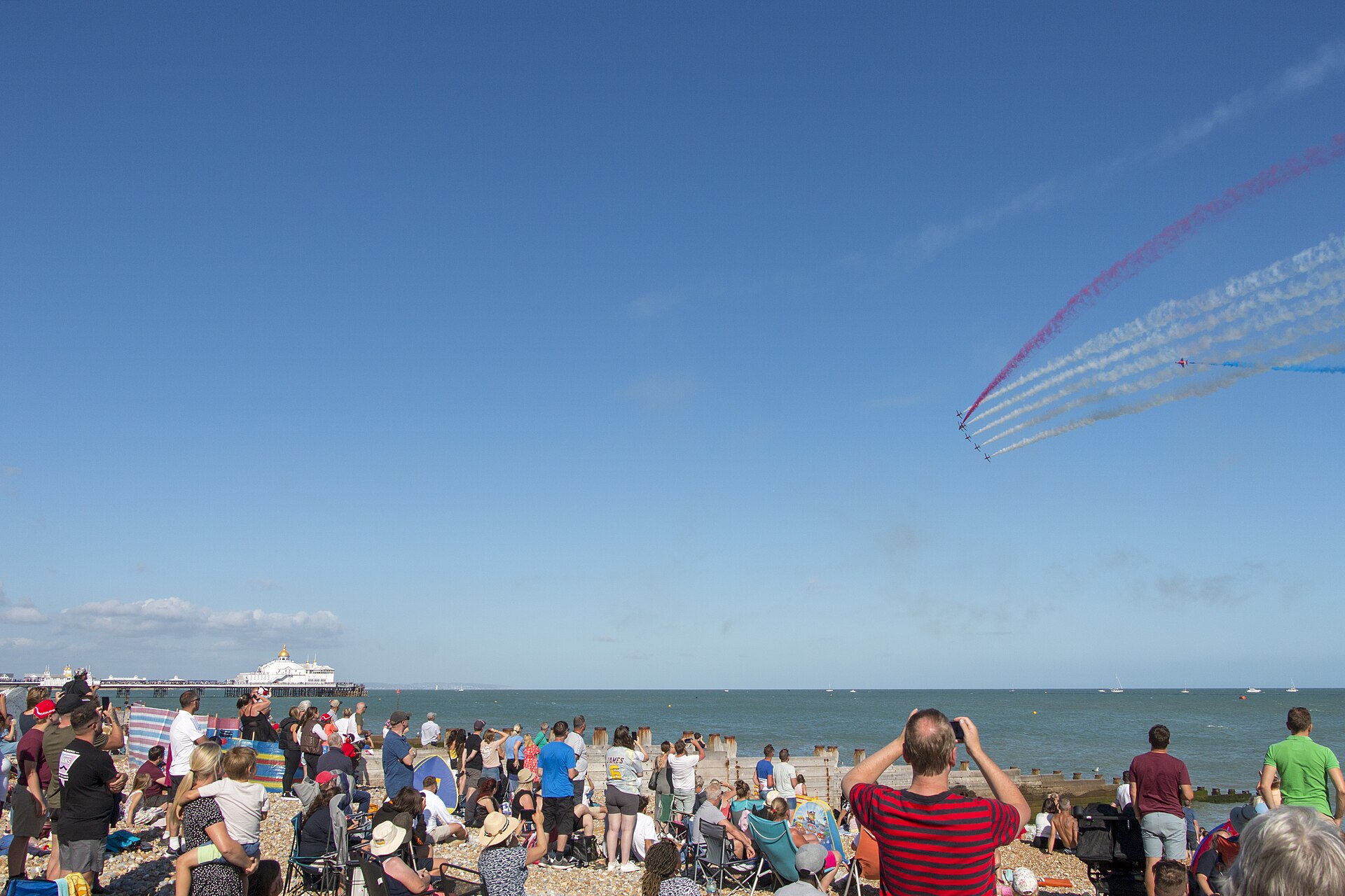 Spectators watching the Eastbourne International Air Show from the seafront
