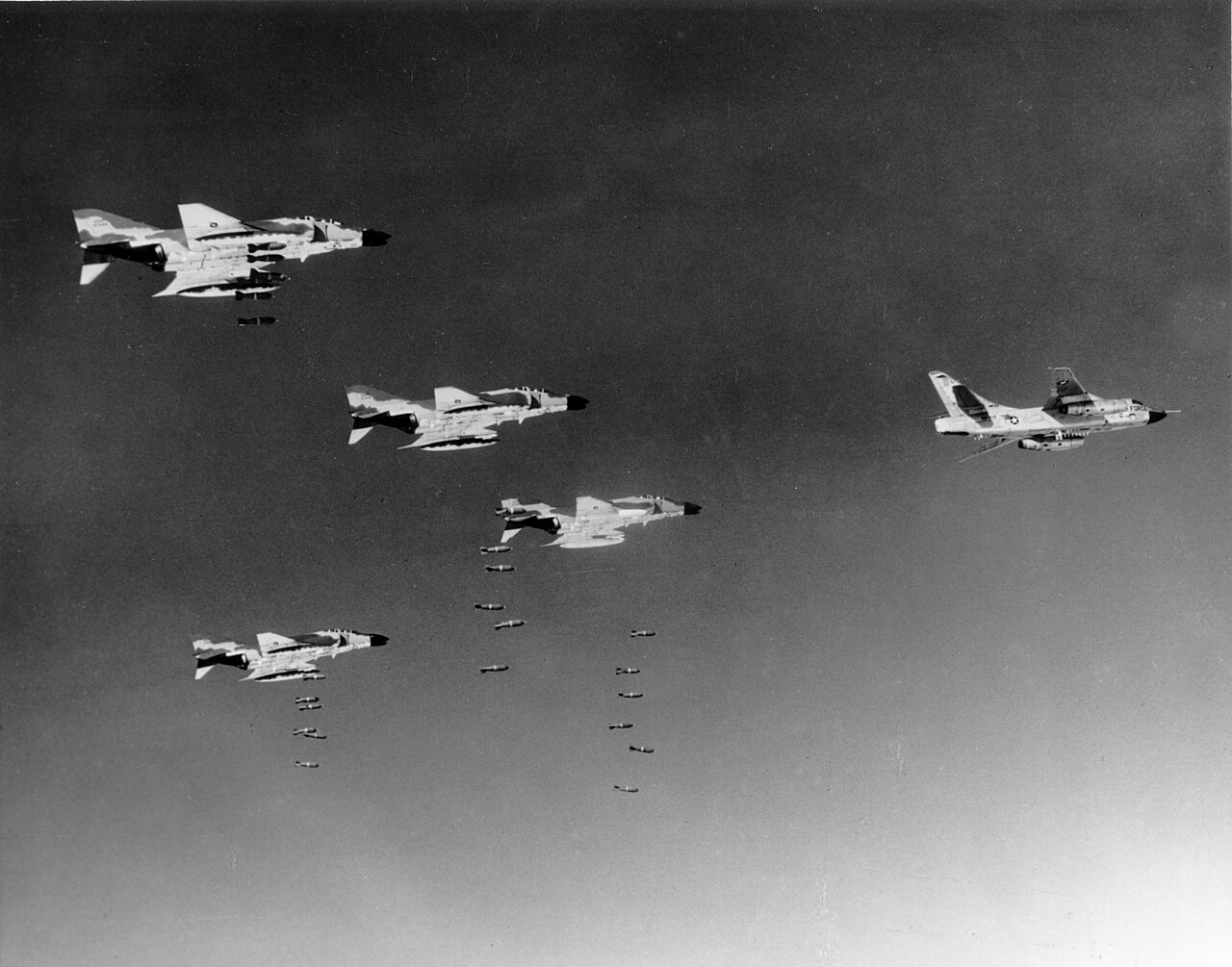 F-4C Phantoms bombing on the lead of an RB-66C over Vietnam, 1966