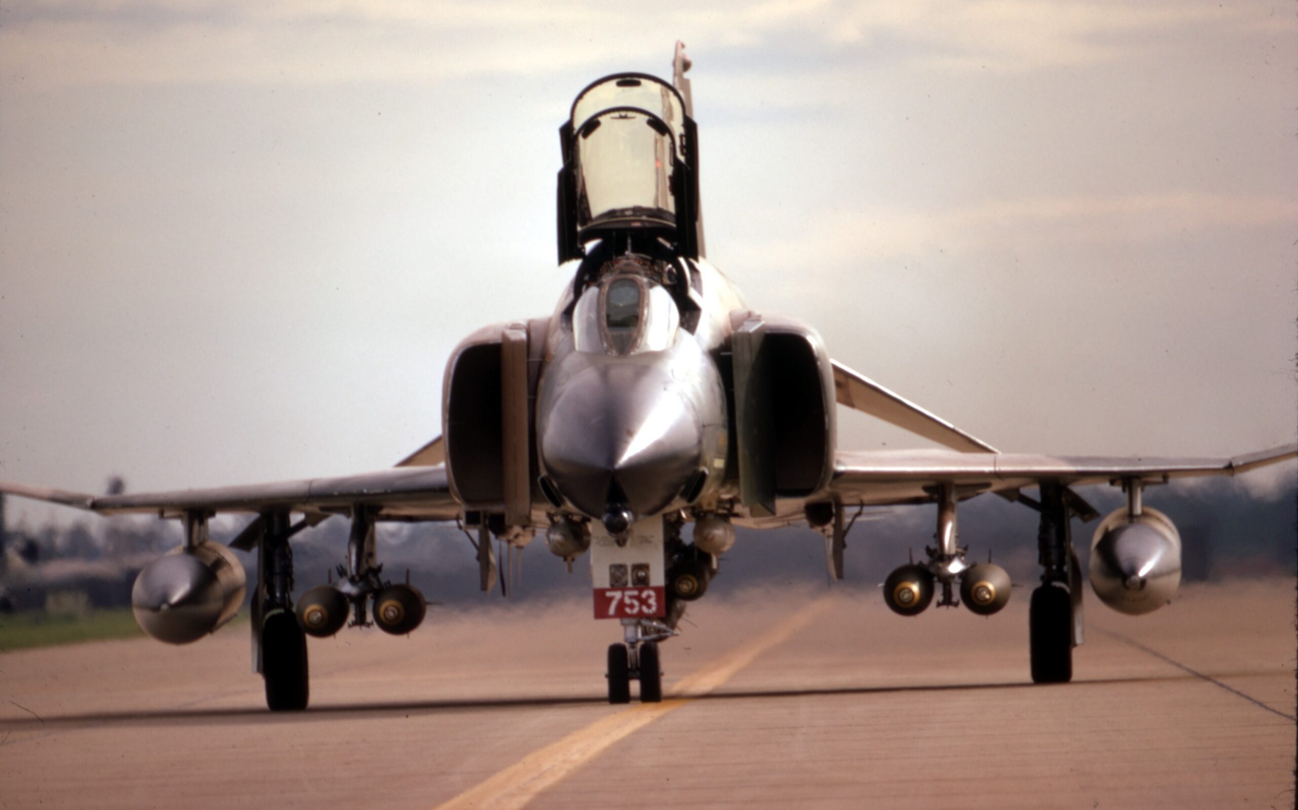 Bomb-laden F-4E Phantom of the 8th Tactical Fighter Wing taxiing at Ubon, Thailand