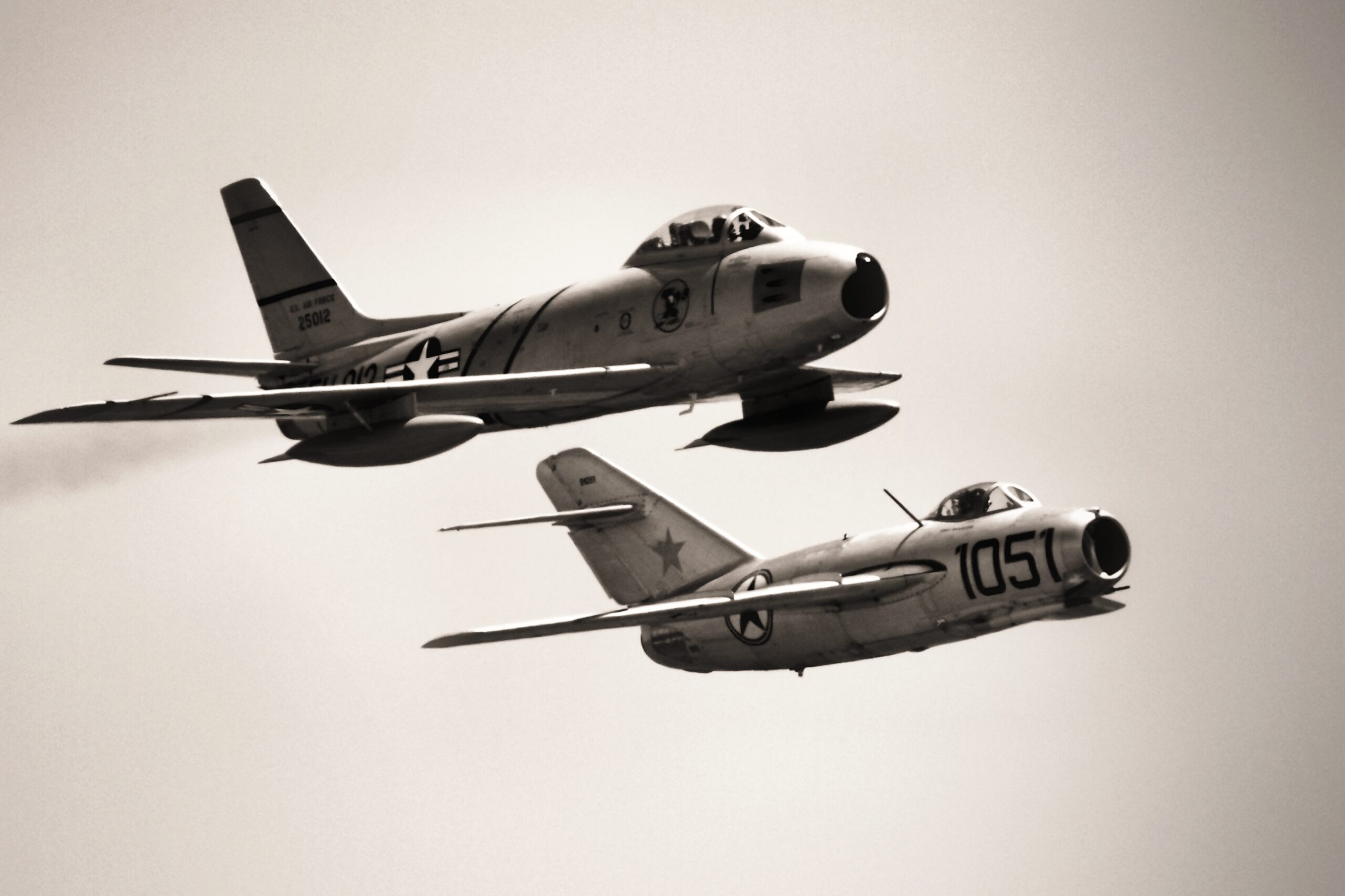 An F-86 Sabre and a MiG-15 together at the Chino Airshow