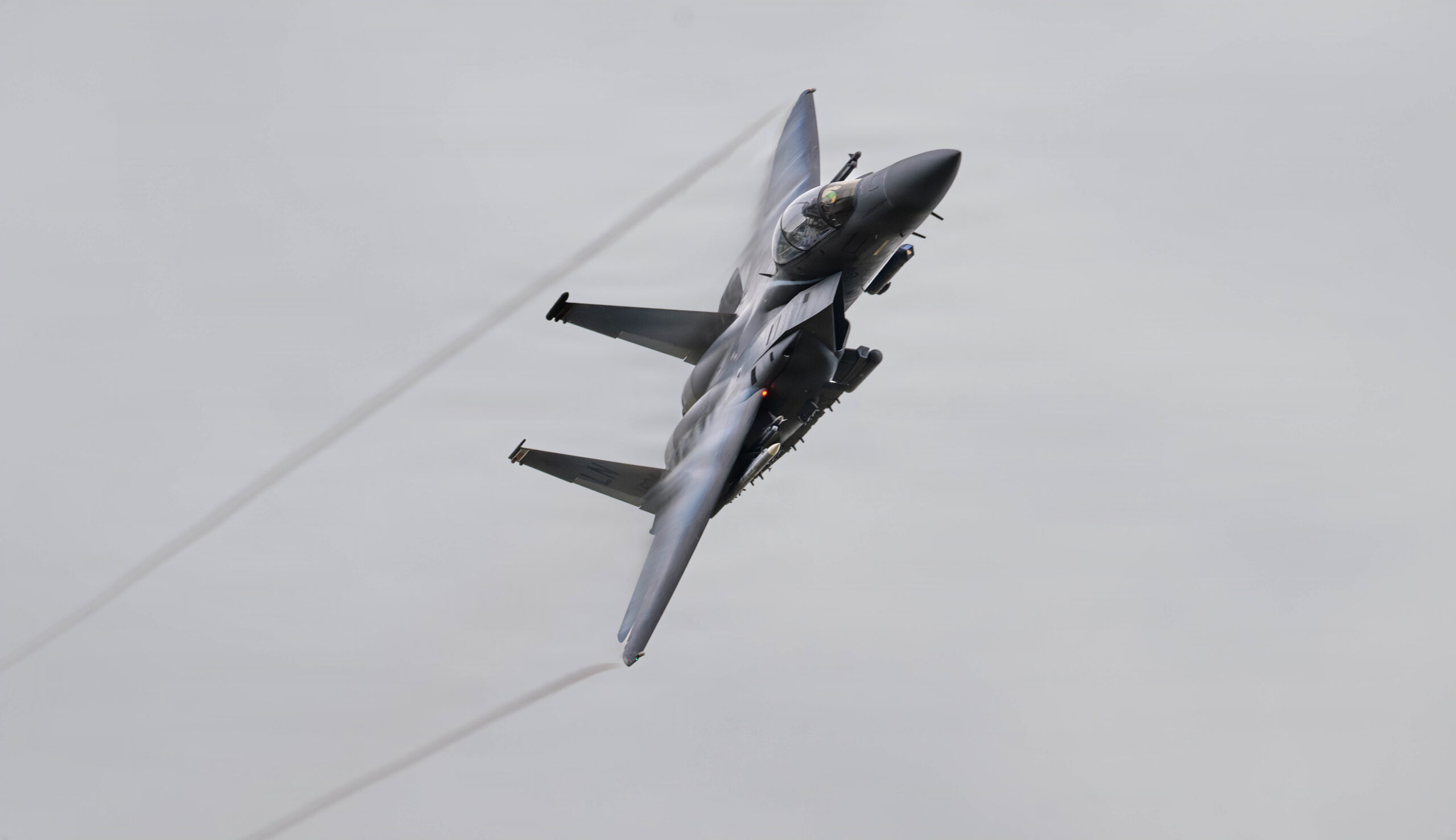 US Air Force F-15E Strike Eagle in heritage paint scheme flying over the UK