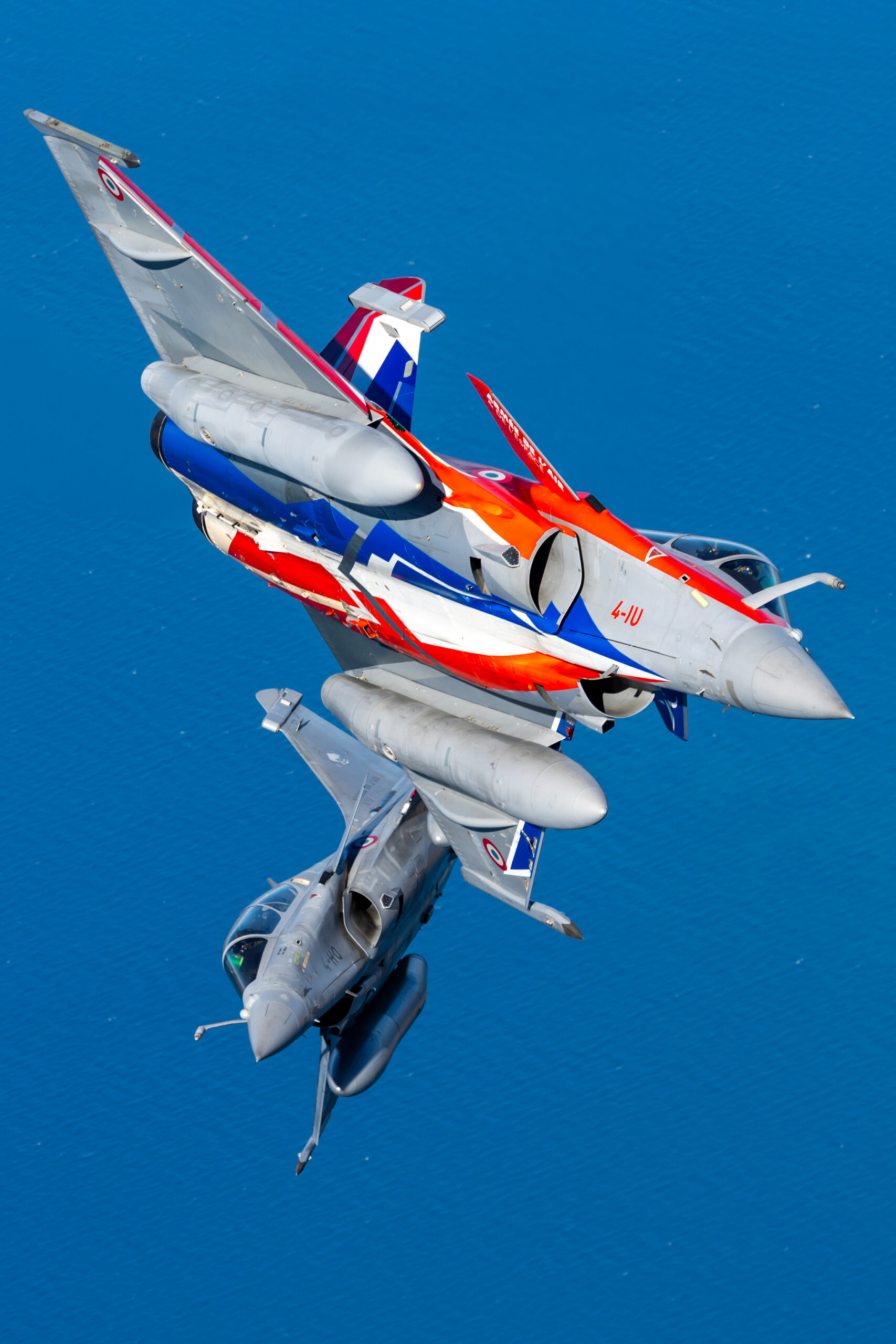 Two French Air Force Rafales climbing vertically