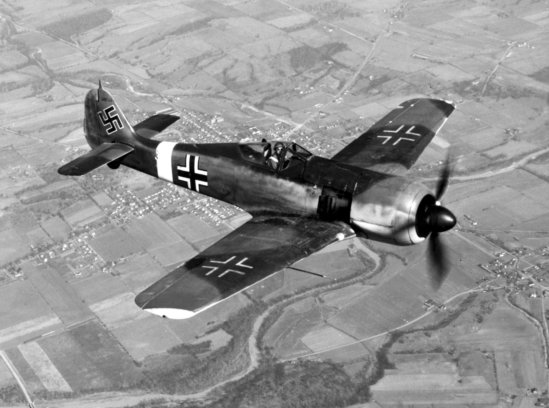A captured Focke-Wulf Fw 190A in flight wearing replicated Luftwaffe insignia