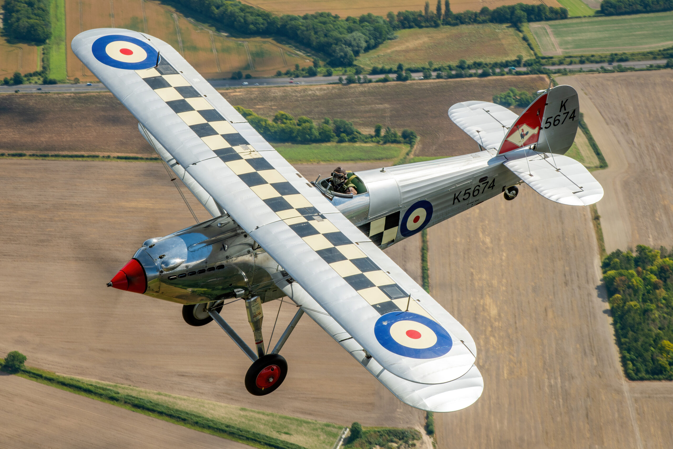 Hawker Fury I K5674 biplane air to air, with checkerboard upper wing, rigging wires and polished cowling full of fine detail