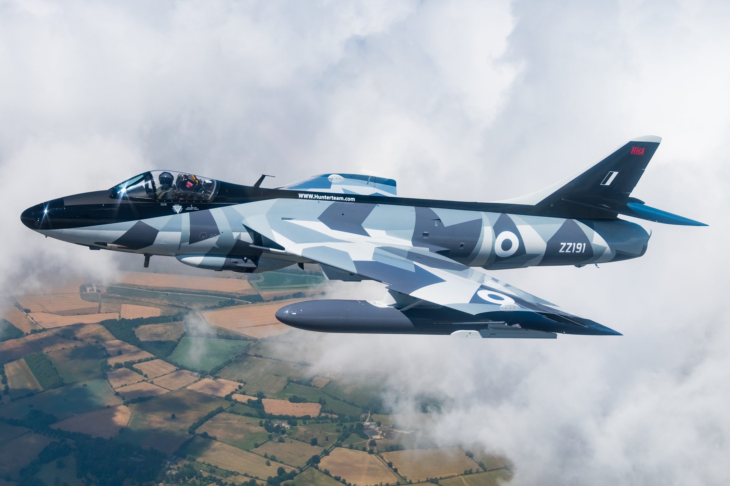 Hawker Hunter F58 ZZ191 in grey splinter camouflage, air to air over cloud