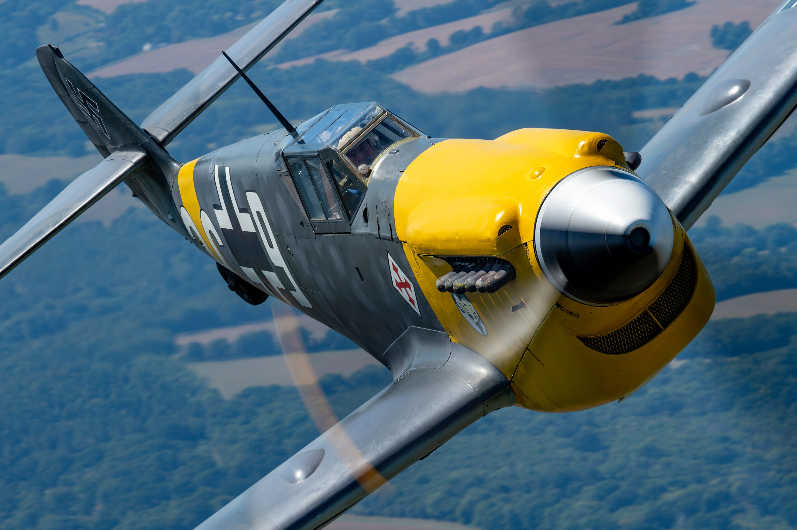 Hispano HA-1112 Buchon with yellow nose in Luftwaffe-style markings air to air