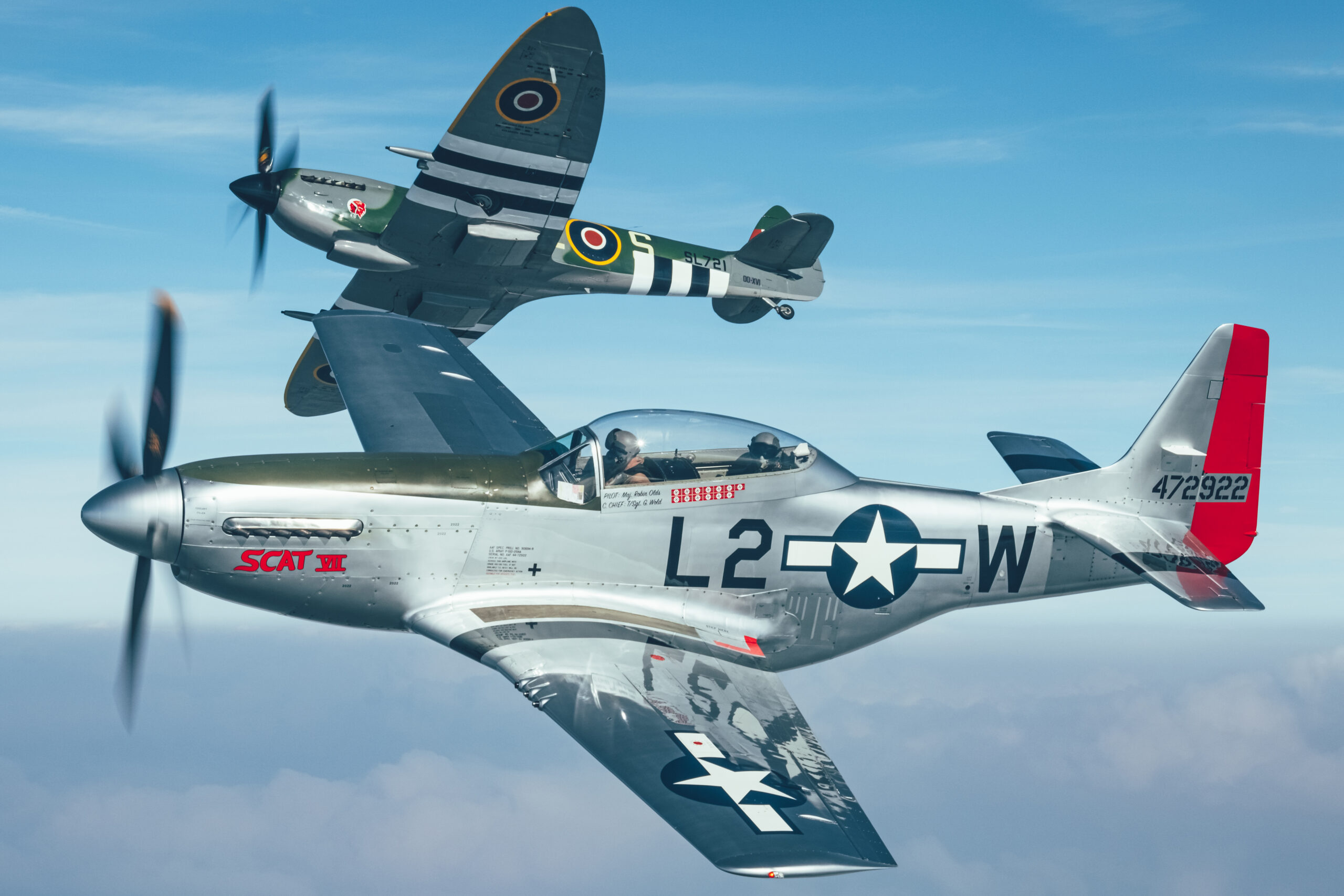 P-51D Mustang TF-51D Scat VII in formation with a Supermarine Spitfire air to air