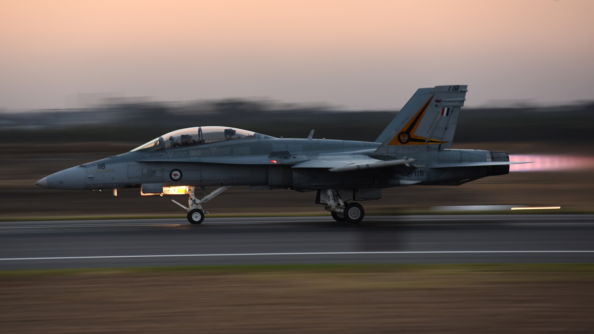 Royal Australian Air Force F/A-18 Hornet taking off at dusk at the 2019 Avalon airshow