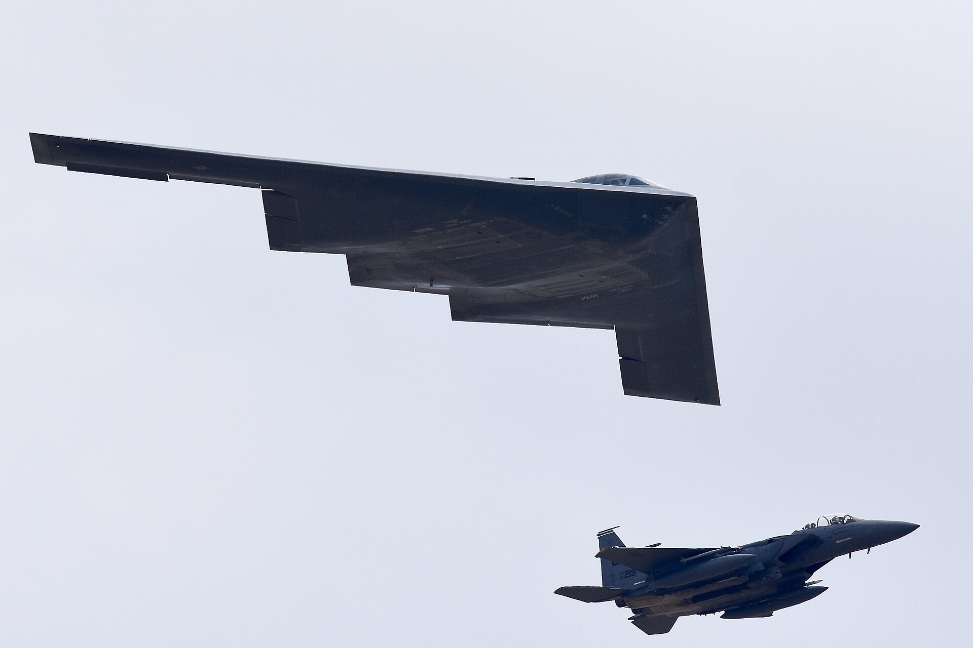 B-2 Spirit flanked by F-15s in a flypast at RIAT 2018