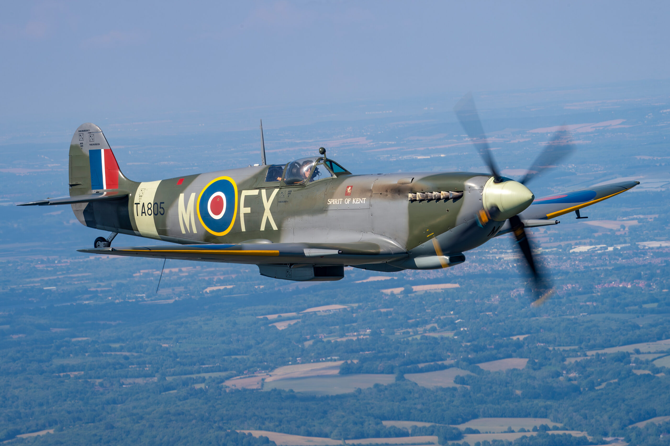Supermarine Spitfire HF9E TA805 M-FX air to air over the English countryside