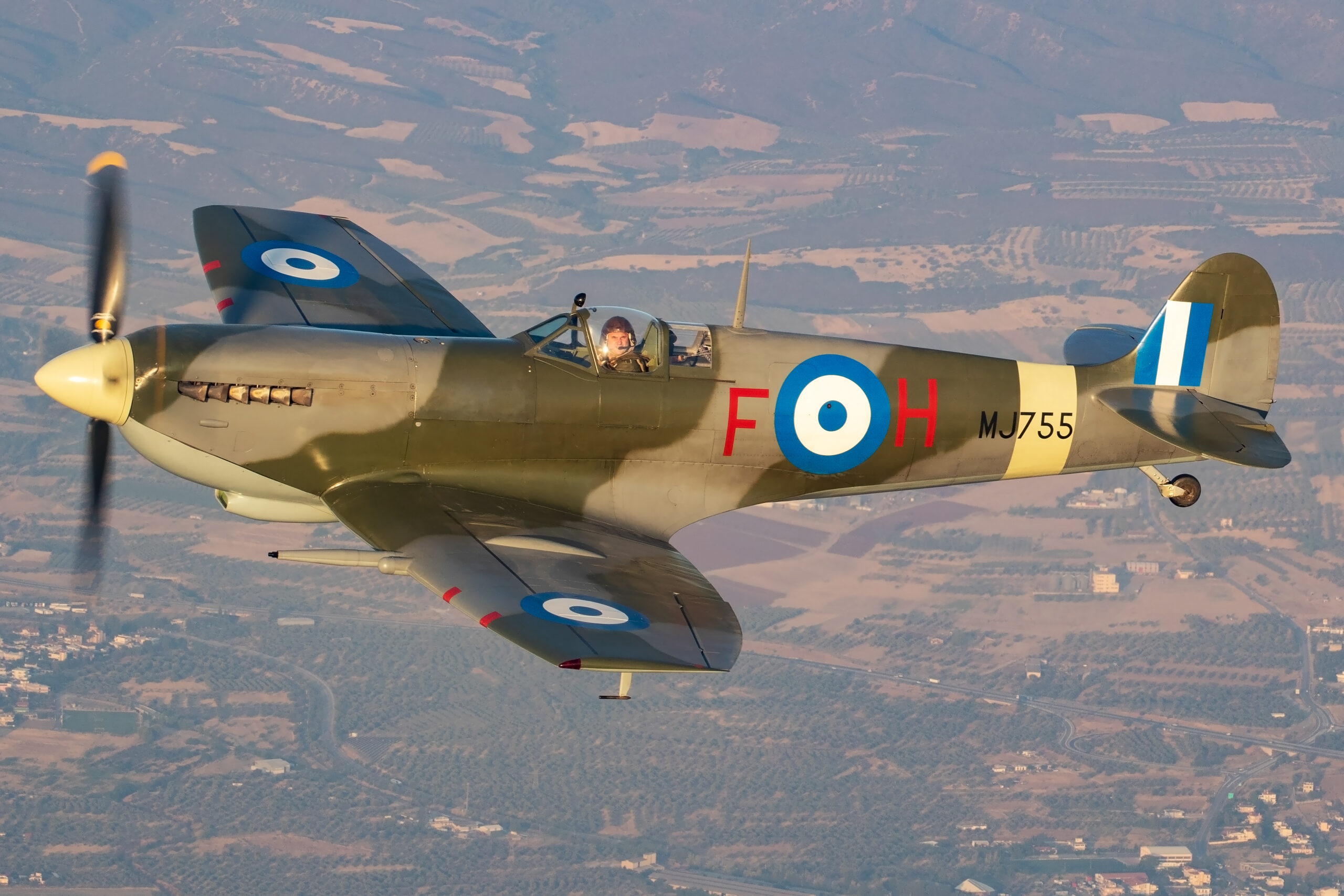 Supermarine Spitfire MJ755 air-to-air in warm golden-hour light