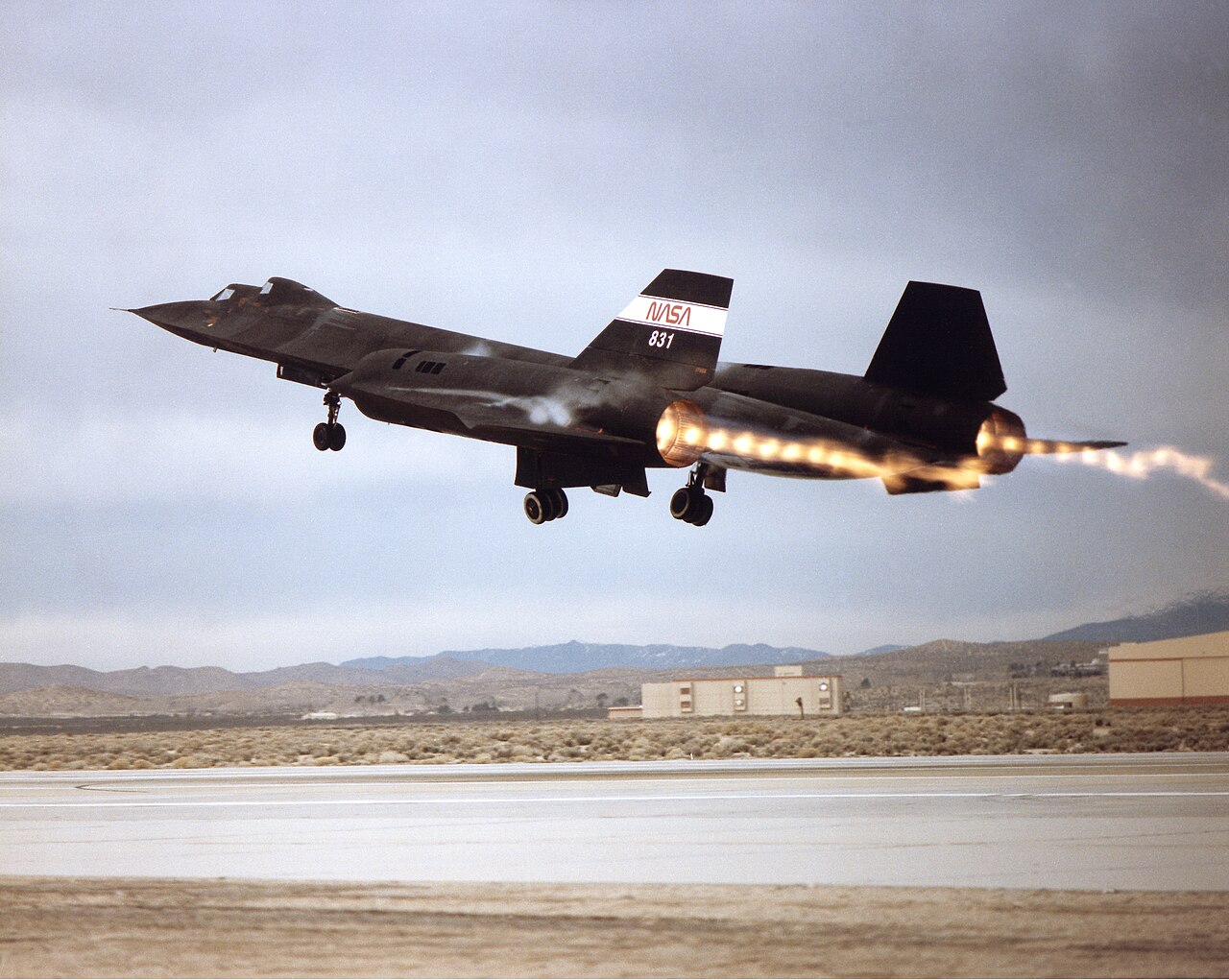 SR-71 taking off with afterburners lit, shock diamonds visible in the exhaust