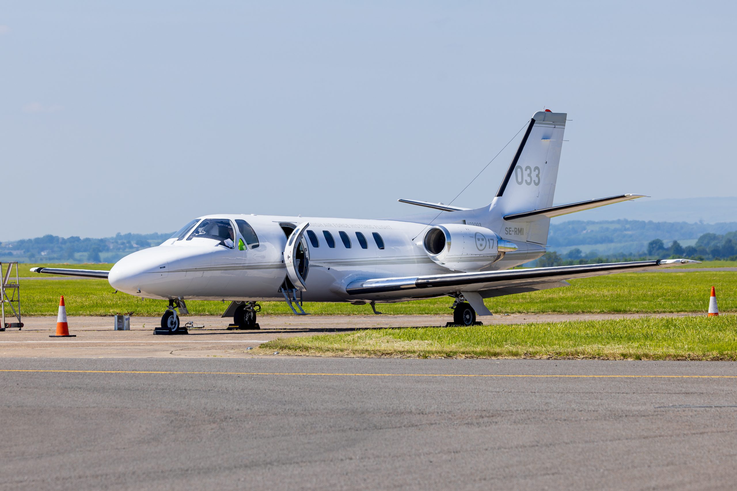Swedish Air Force Historic Flight Cessna Citation SE-RMI parked on the ramp with cones and chocks