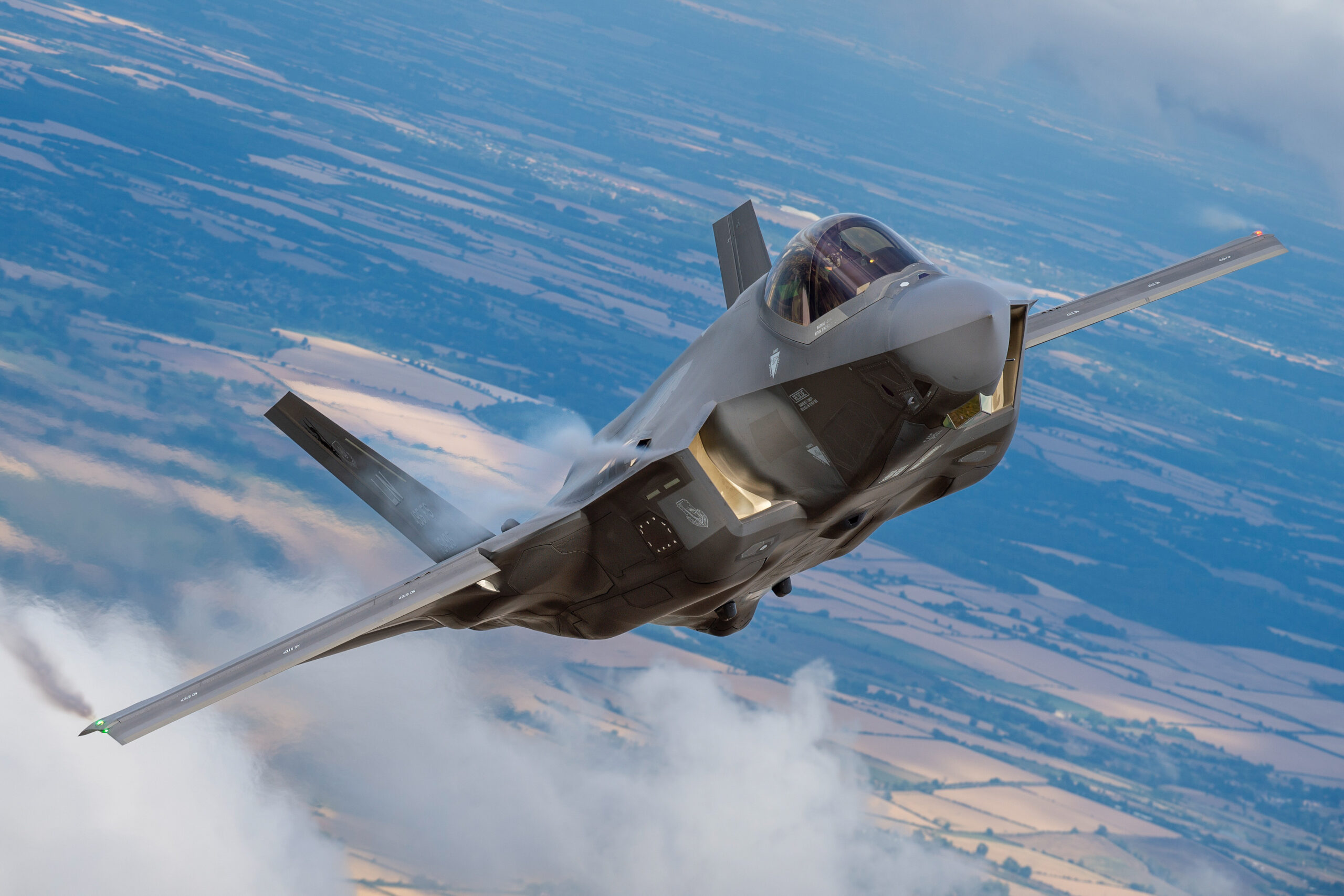 USAF F-35A banking over English countryside at RIAT 2025