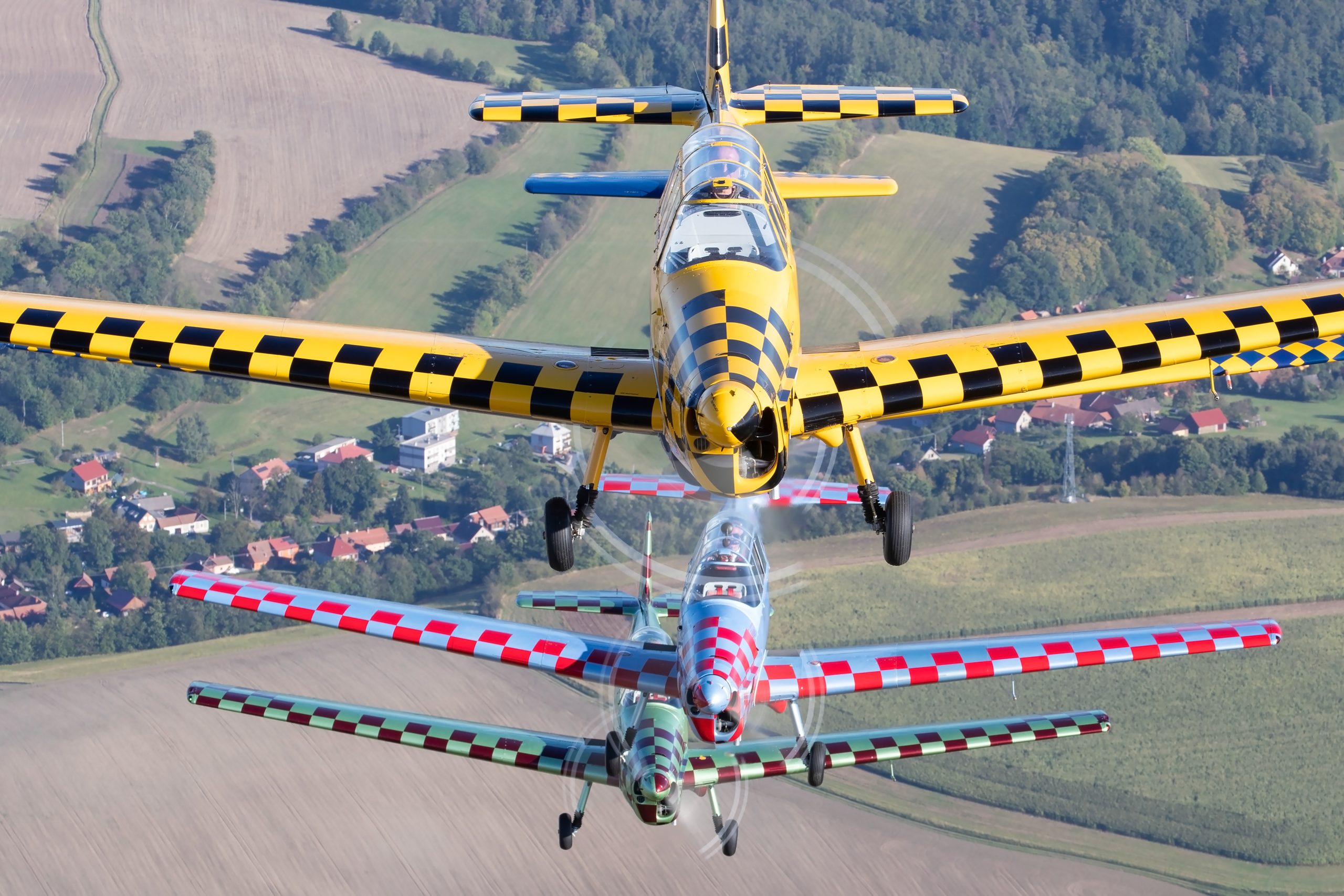 The Zlin Follow Me formation in tight echelon, air to air