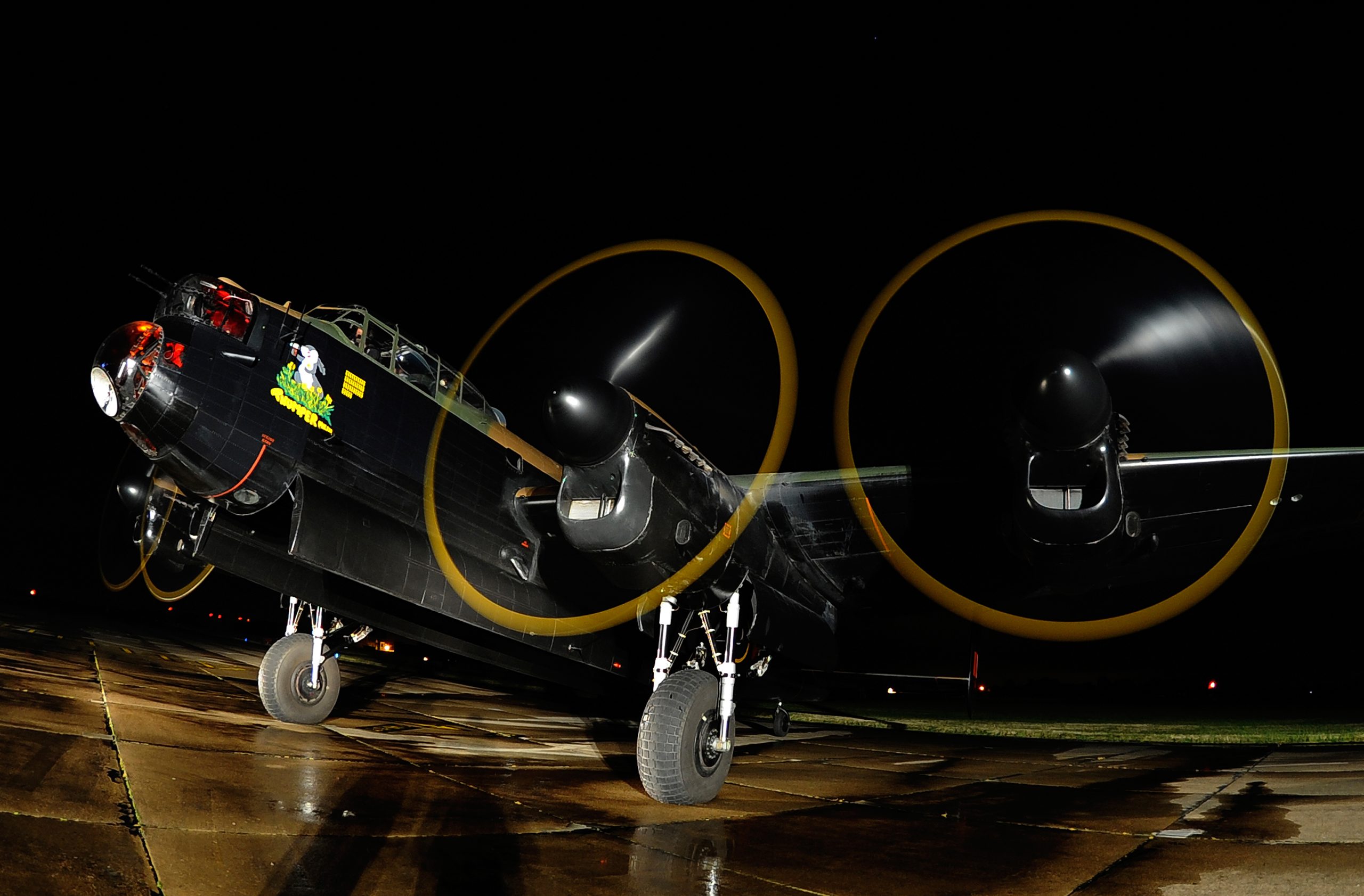 The Battle of Britain Memorial Flight Lancaster PA474 running its engines at night
