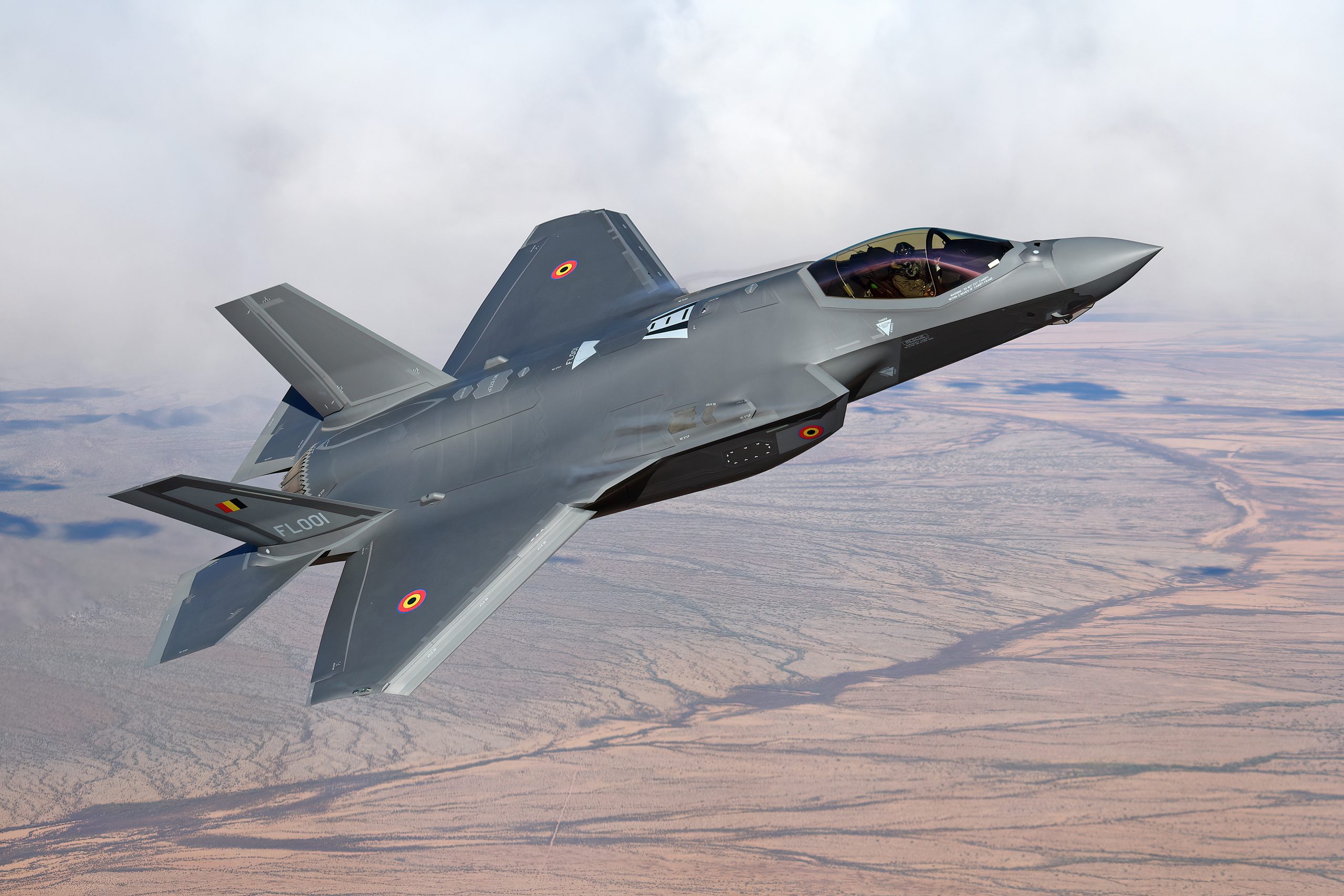 Belgian Air Force F-35A Lightning II banking over the desert, air to air