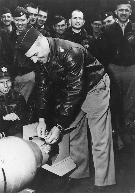 Doolittle wires Japanese friendship medals to a 500 lb bomb aboard USS Hornet