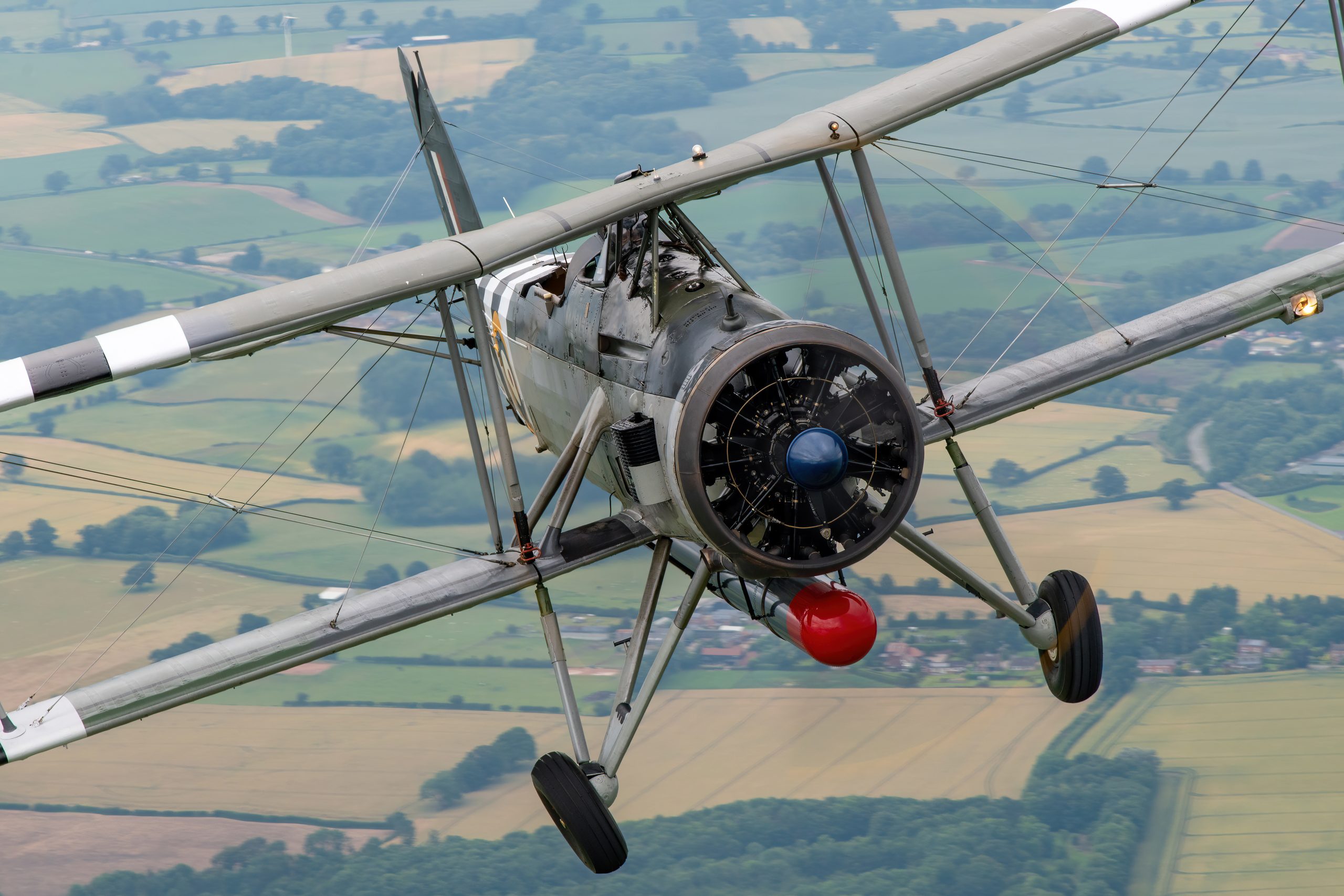 Fairey Swordfish W5856 front quarter over English fields, air to air