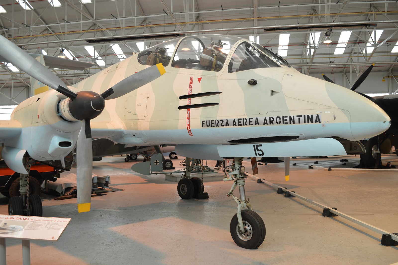 FMA IA58 Pucara A-515 in Fuerza Aerea Argentina desert camouflage preserved indoors at the Royal Air Force Museum Cosford