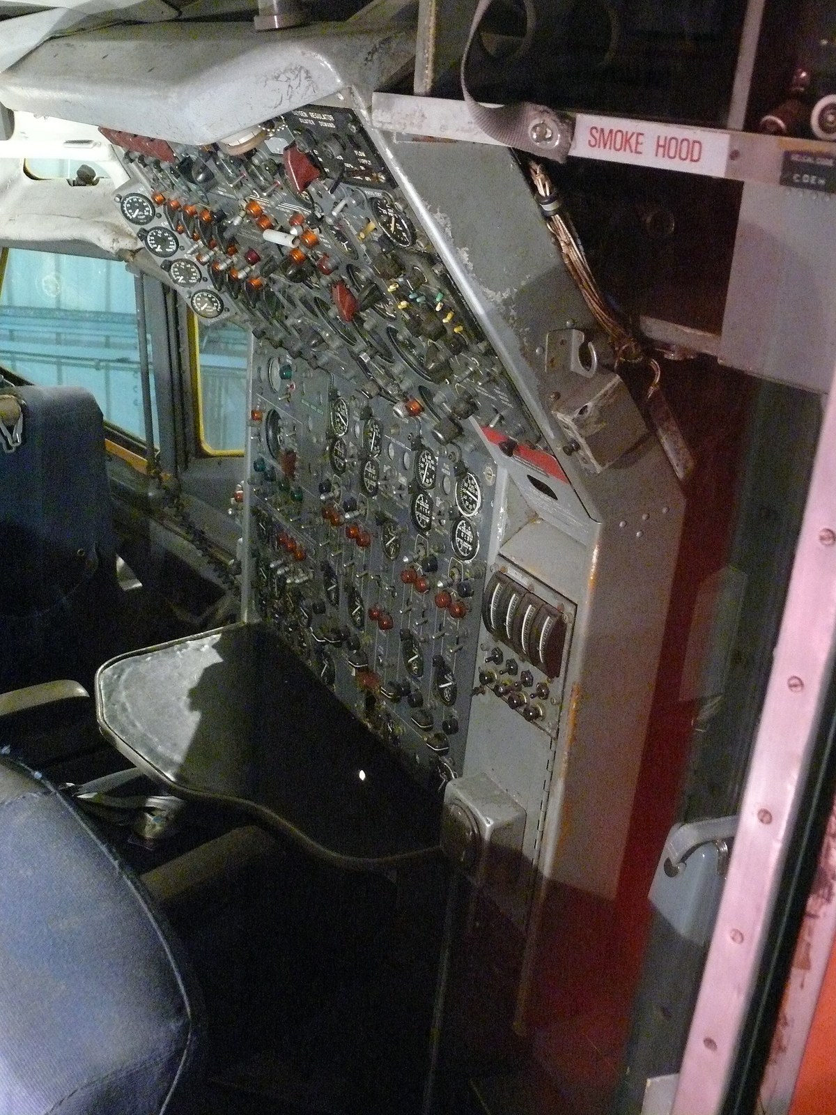 Flight engineer's panel in a Boeing 707 cockpit, facing sideways behind the pilots