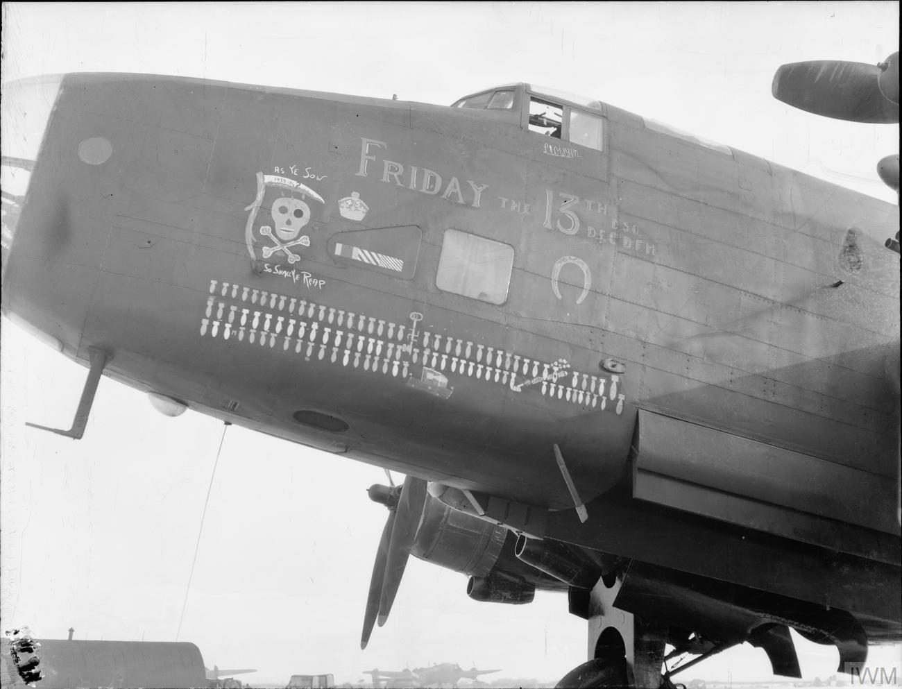 Nose art of Handley Page Halifax LV907 Friday the 13th showing its bomb log, 1945