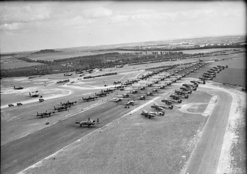 Halifax glider tugs and Hamilcar gliders lined up at RAF Tarrant Rushton for Operation Mallard, June 1944