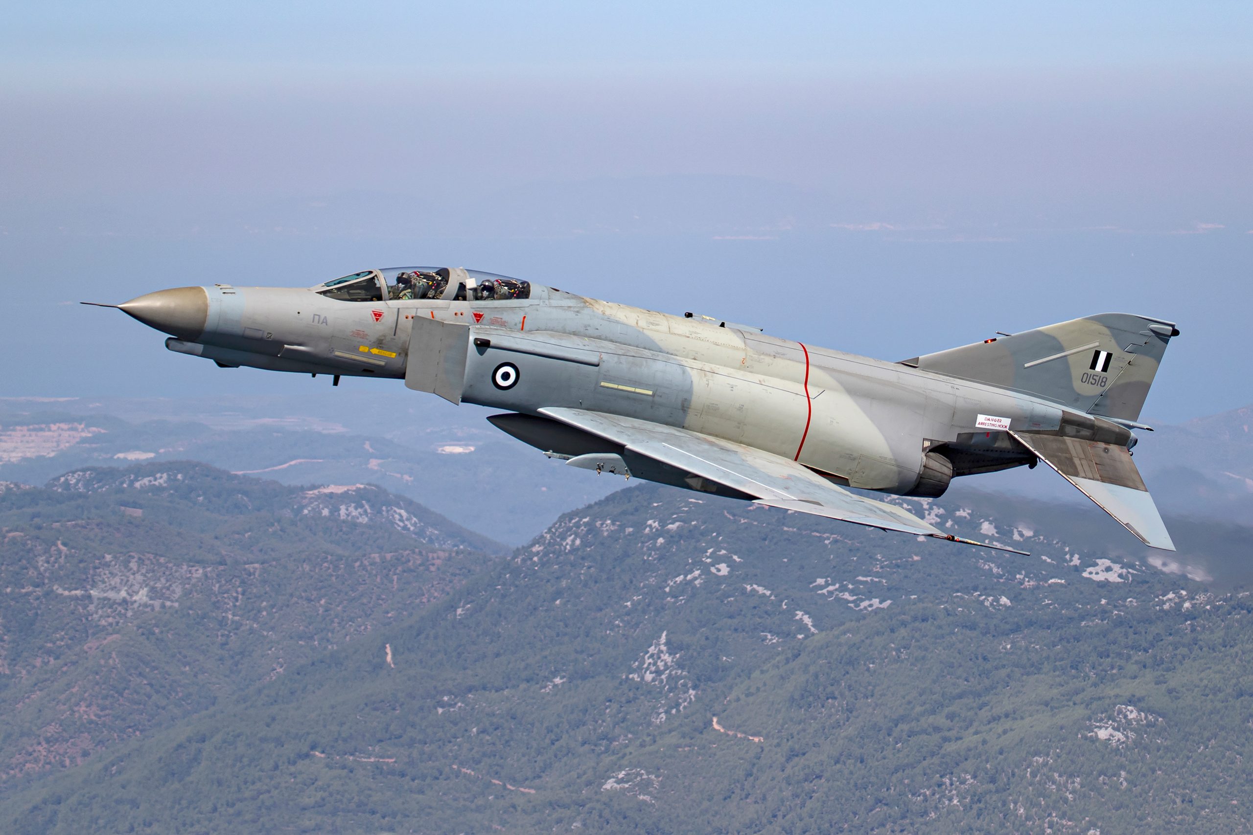 Hellenic Air Force F-4E AUP Phantom II 01518 side profile over Greek mountains, air to air
