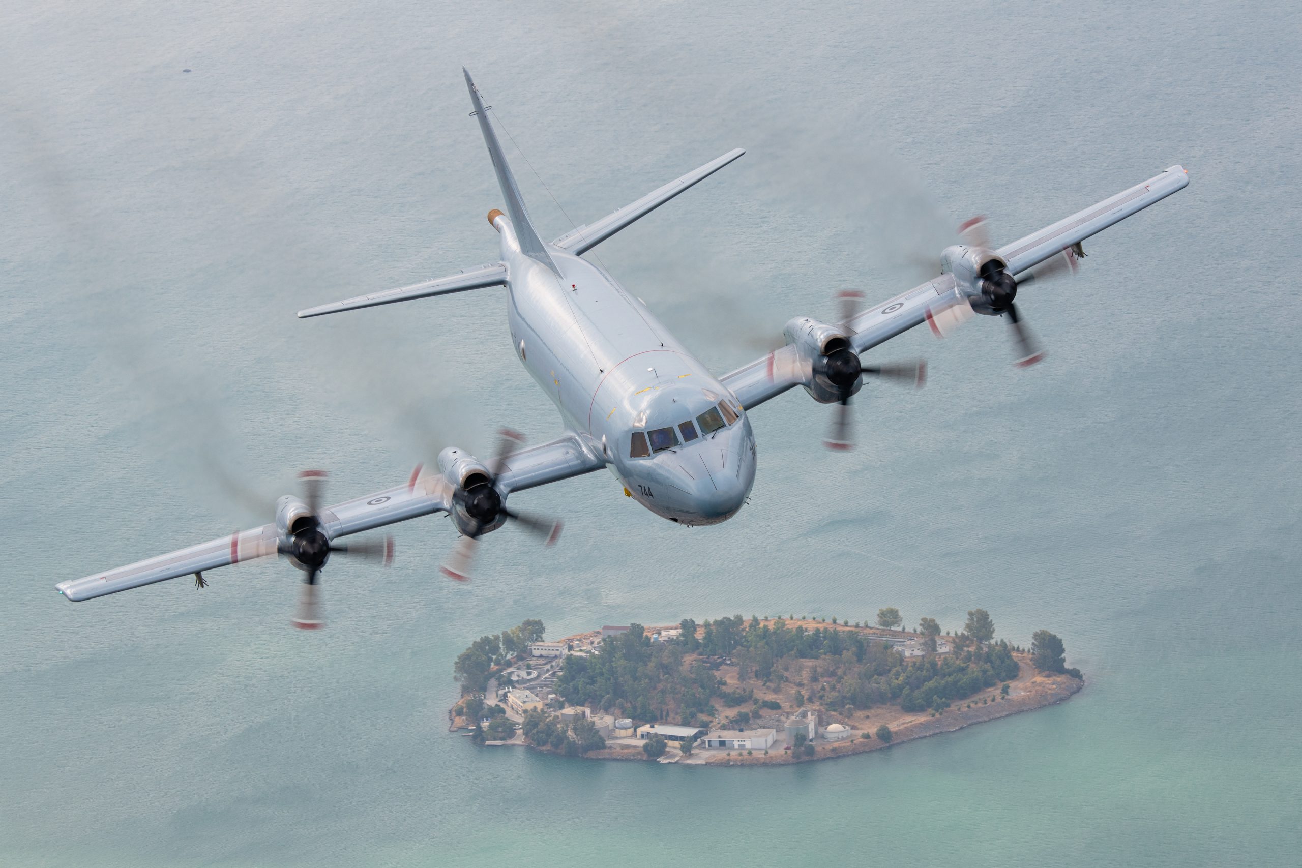 Hellenic Navy P-3B Orion 152744 over a Greek island, air to air
