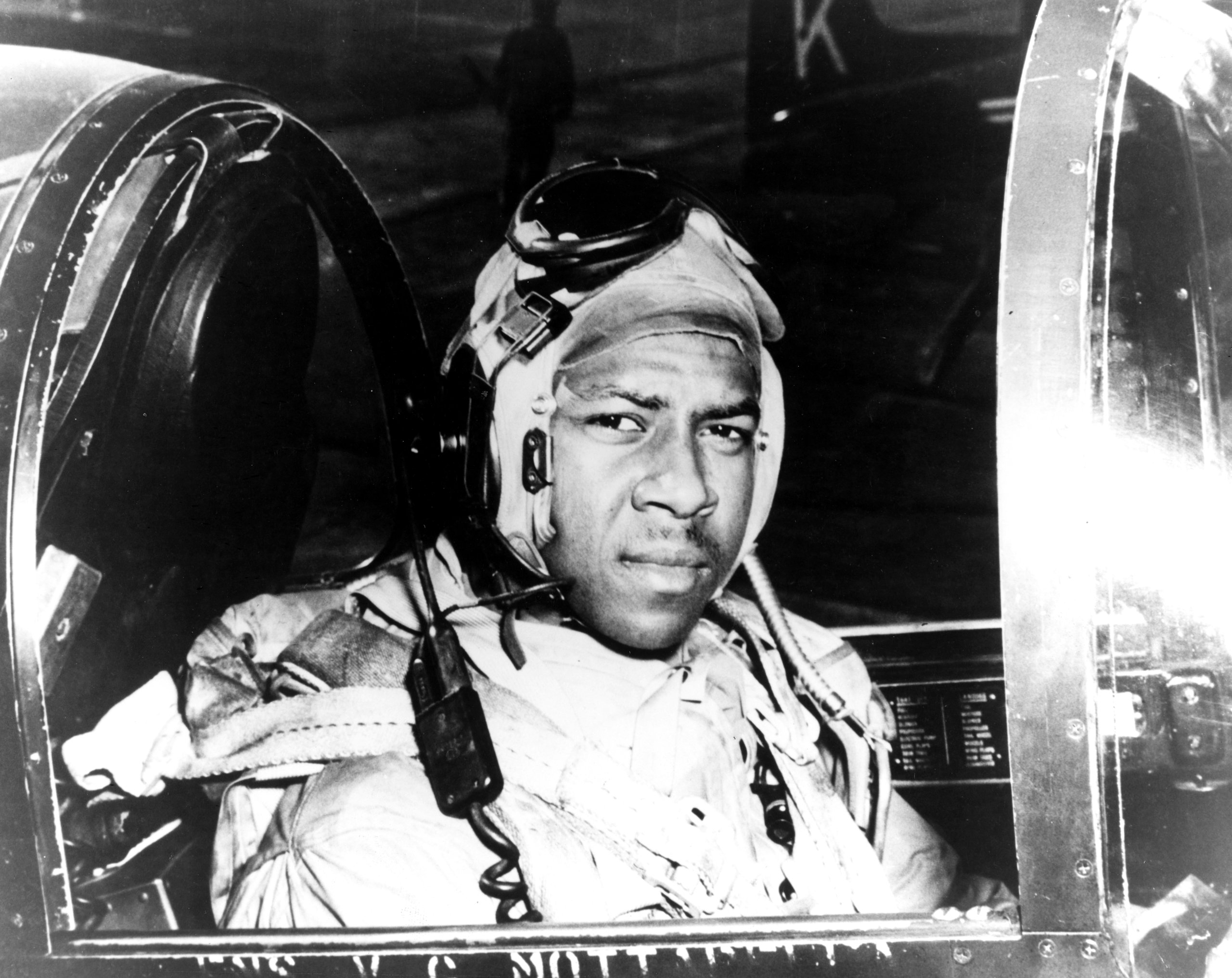 Ensign Jesse L. Brown in the cockpit of an F4U-4 Corsair in 1950