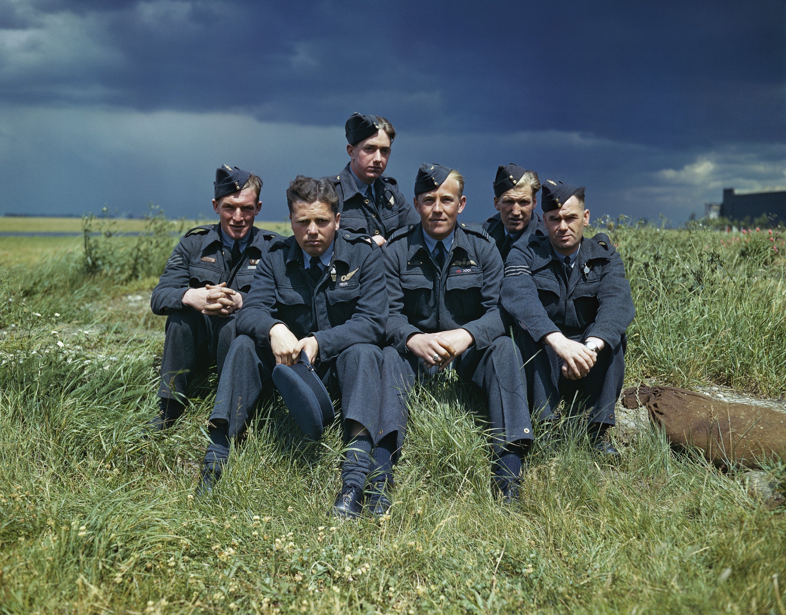 Joe McCarthy and his crew at Scampton in colour, July 1943, including bomb aimer Johnny Johnson