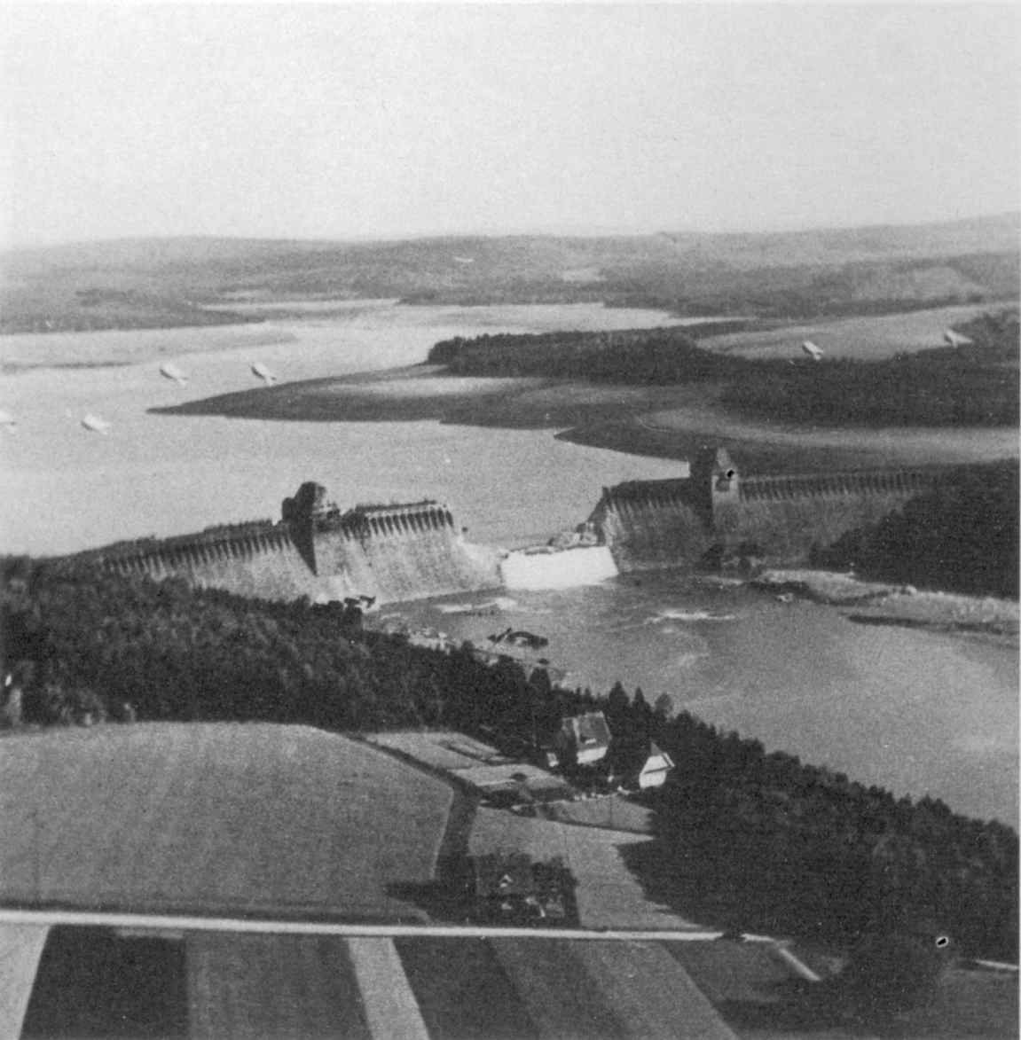 The breached Mohne dam photographed by a reconnaissance Spitfire on the morning of 17 May 1943