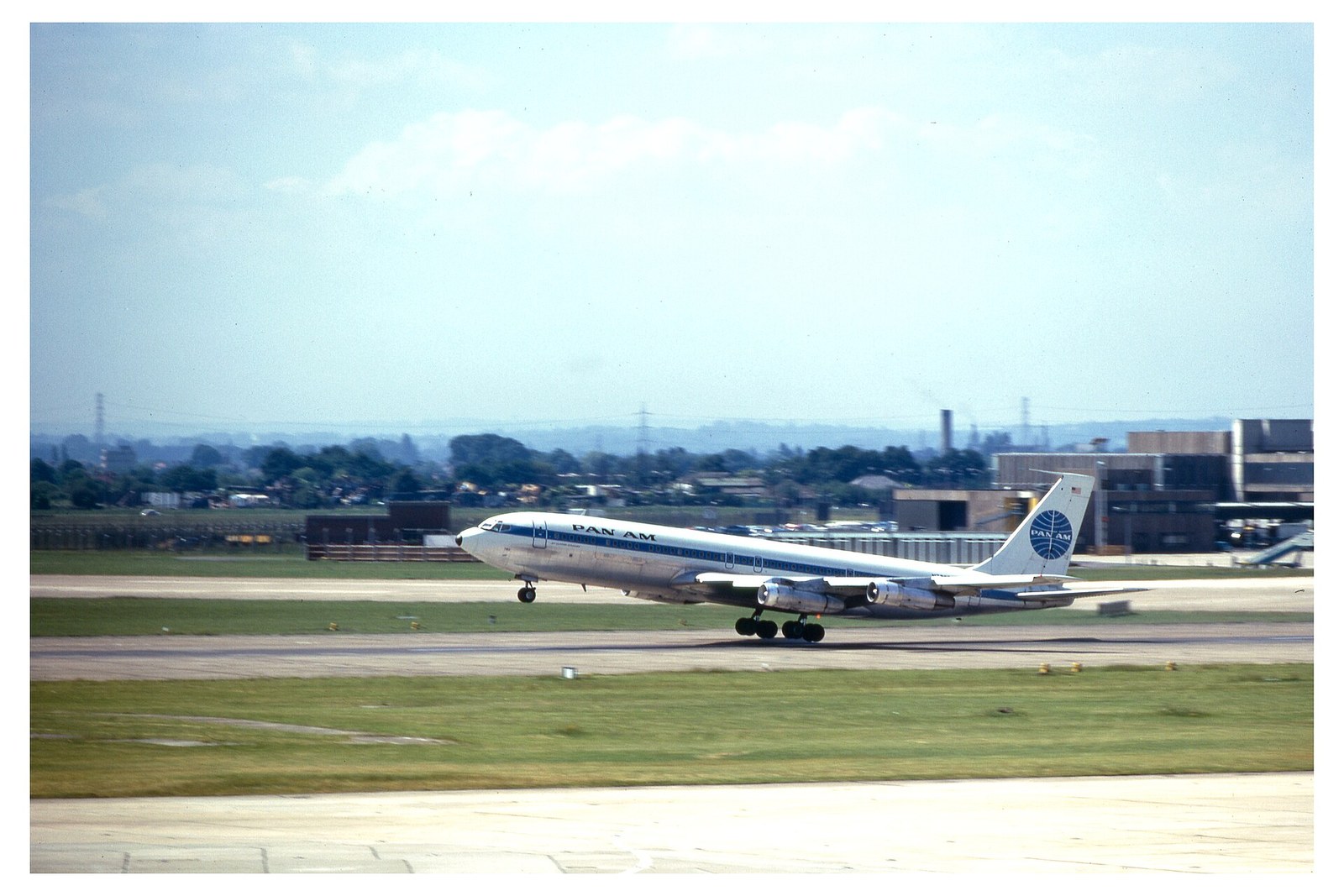Pan American Boeing 707 in the blue globe scheme taking off from London Heathrow